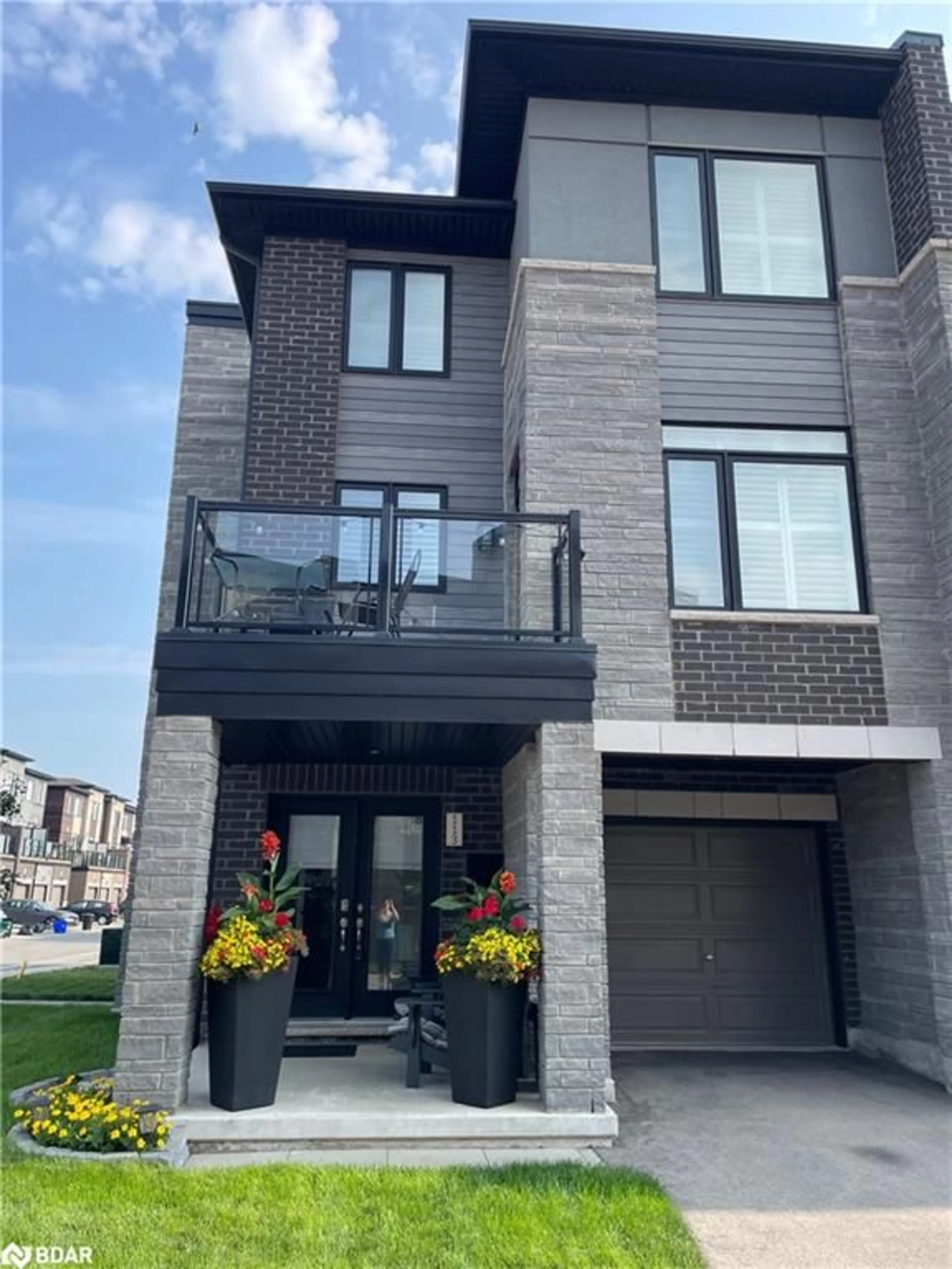 Home with brick exterior material, street for 590 North Service Rd #113, Stoney Creek Ontario L8E 0K5