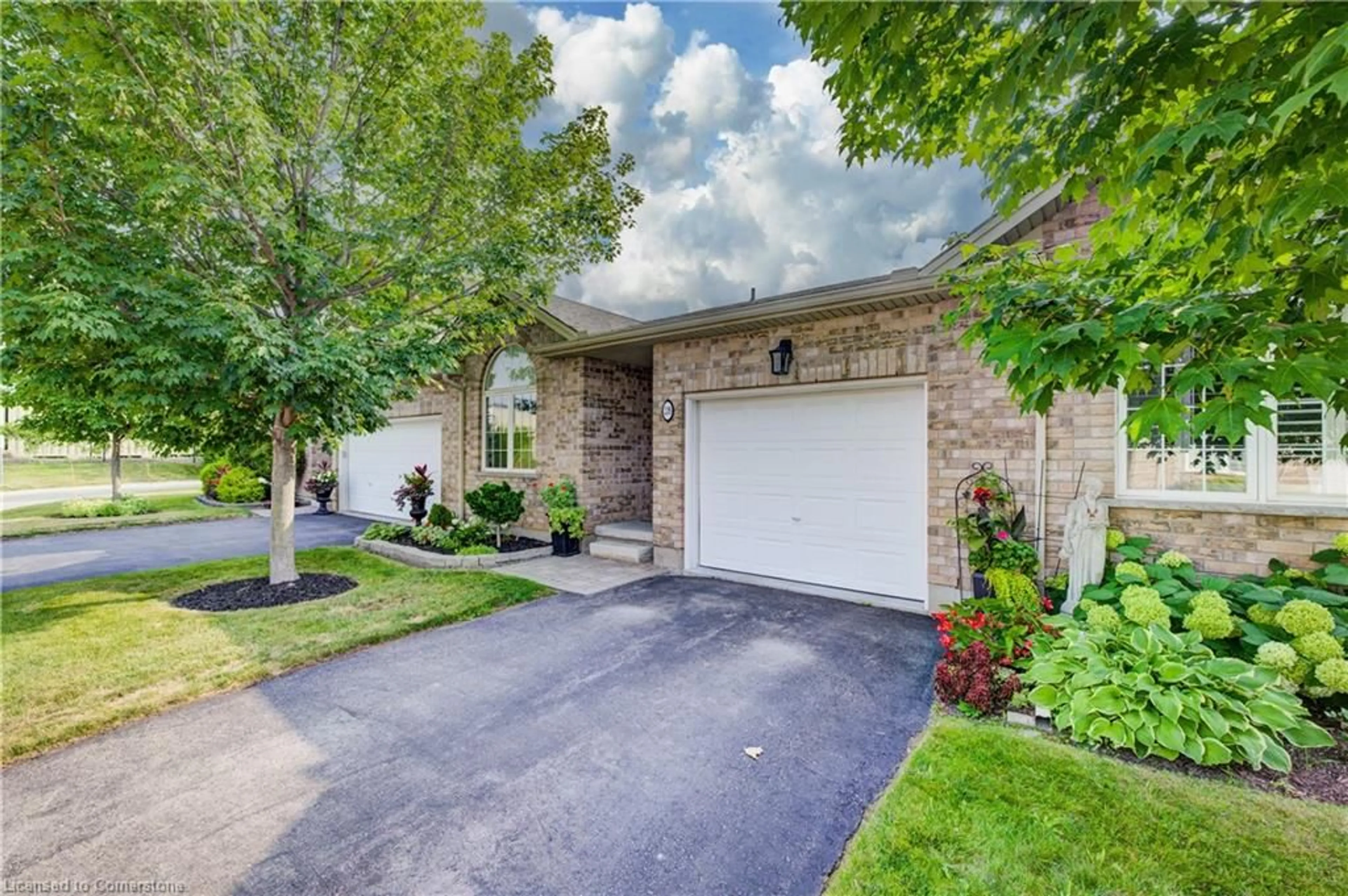 Home with brick exterior material, street for 35 Green Gate Blvd #28, Cambridge Ontario N1T 0A3