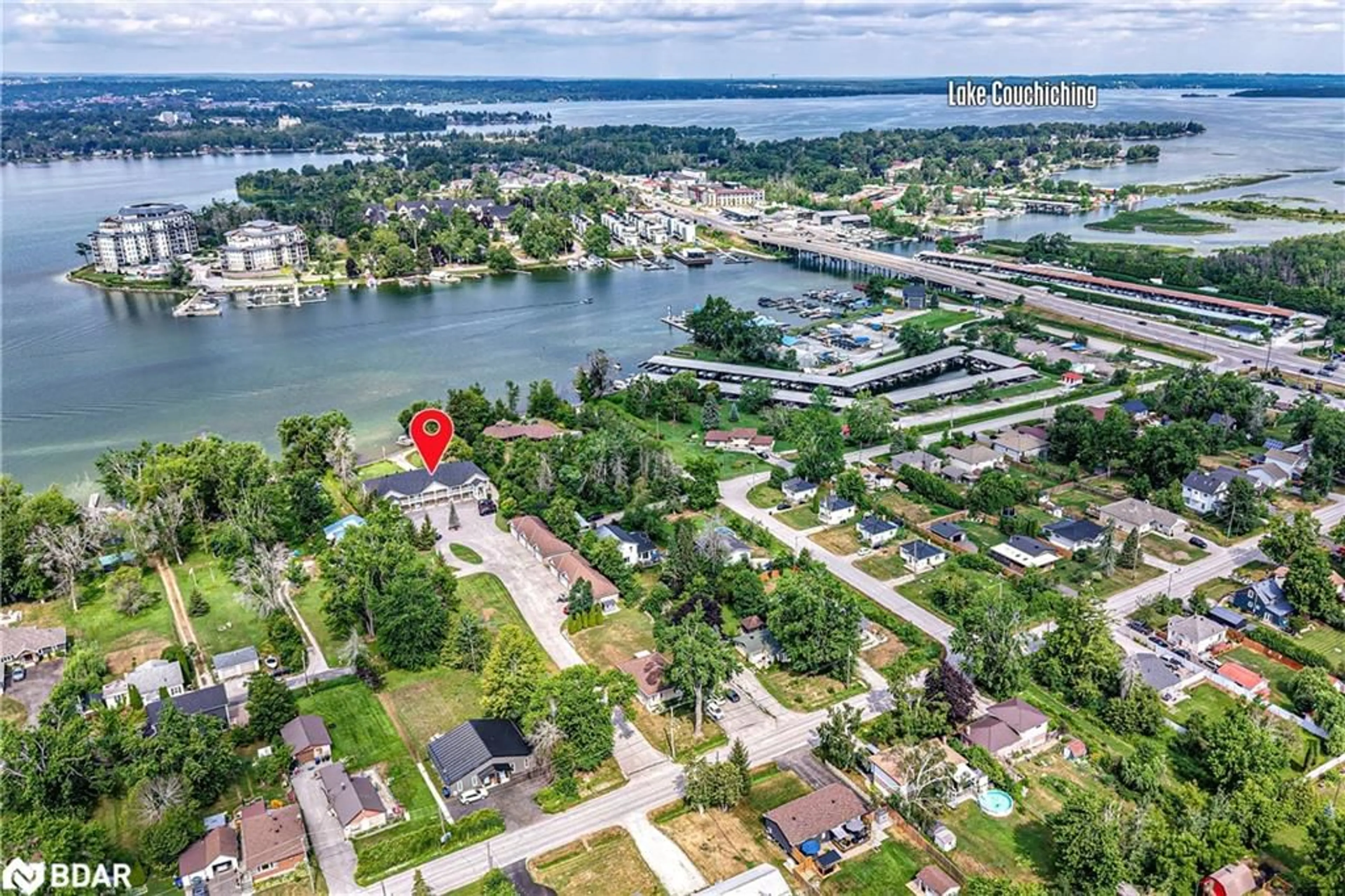 A pic from outside/outdoor area/front of a property/back of a property/a pic from drone, water/lake/river/ocean view for 43 Creighton St #204, Ramara Ontario L3V 1B1