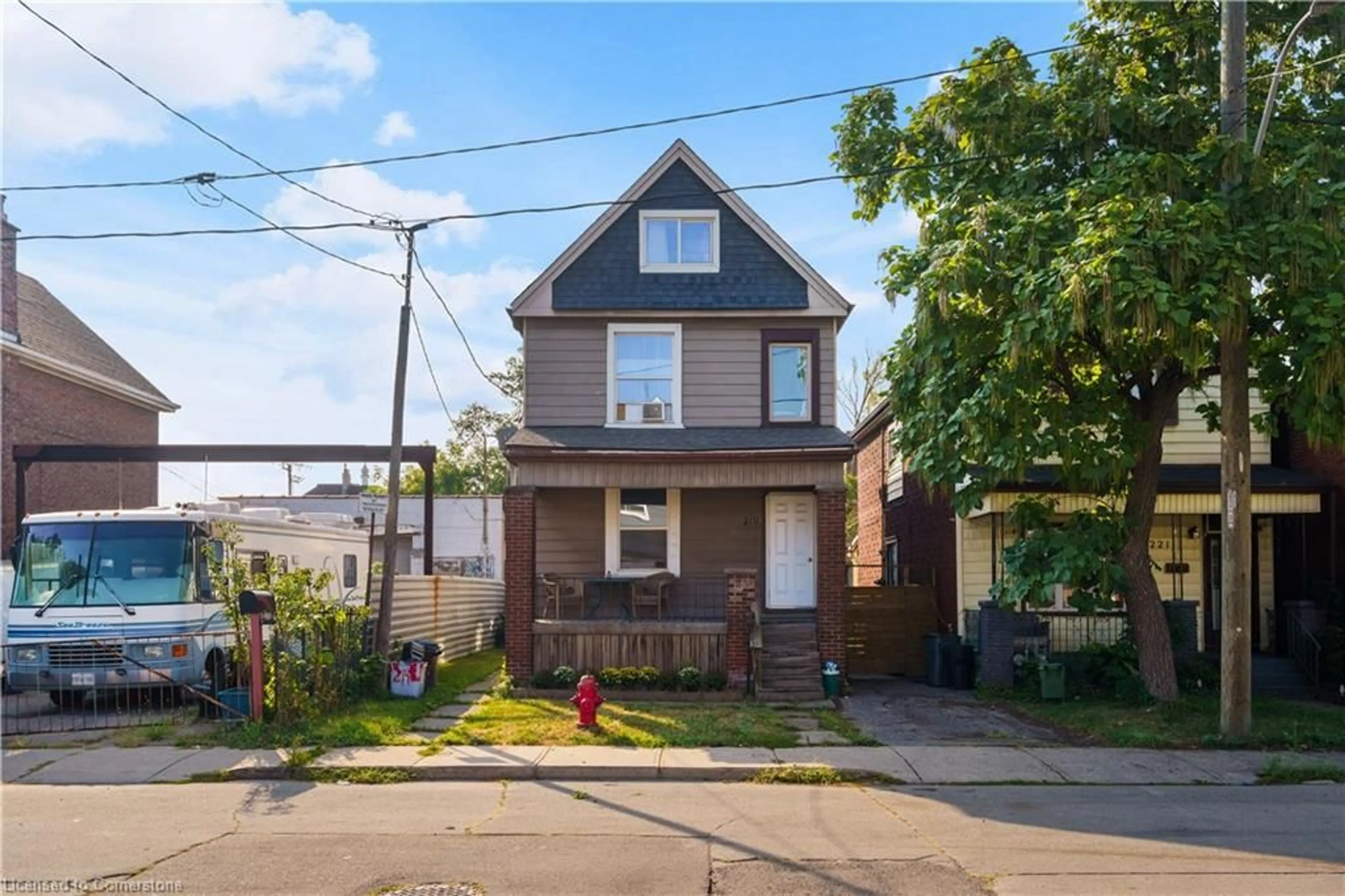 Home with brick exterior material, street for 219 Avondale St, Hamilton Ontario L8L 7C4