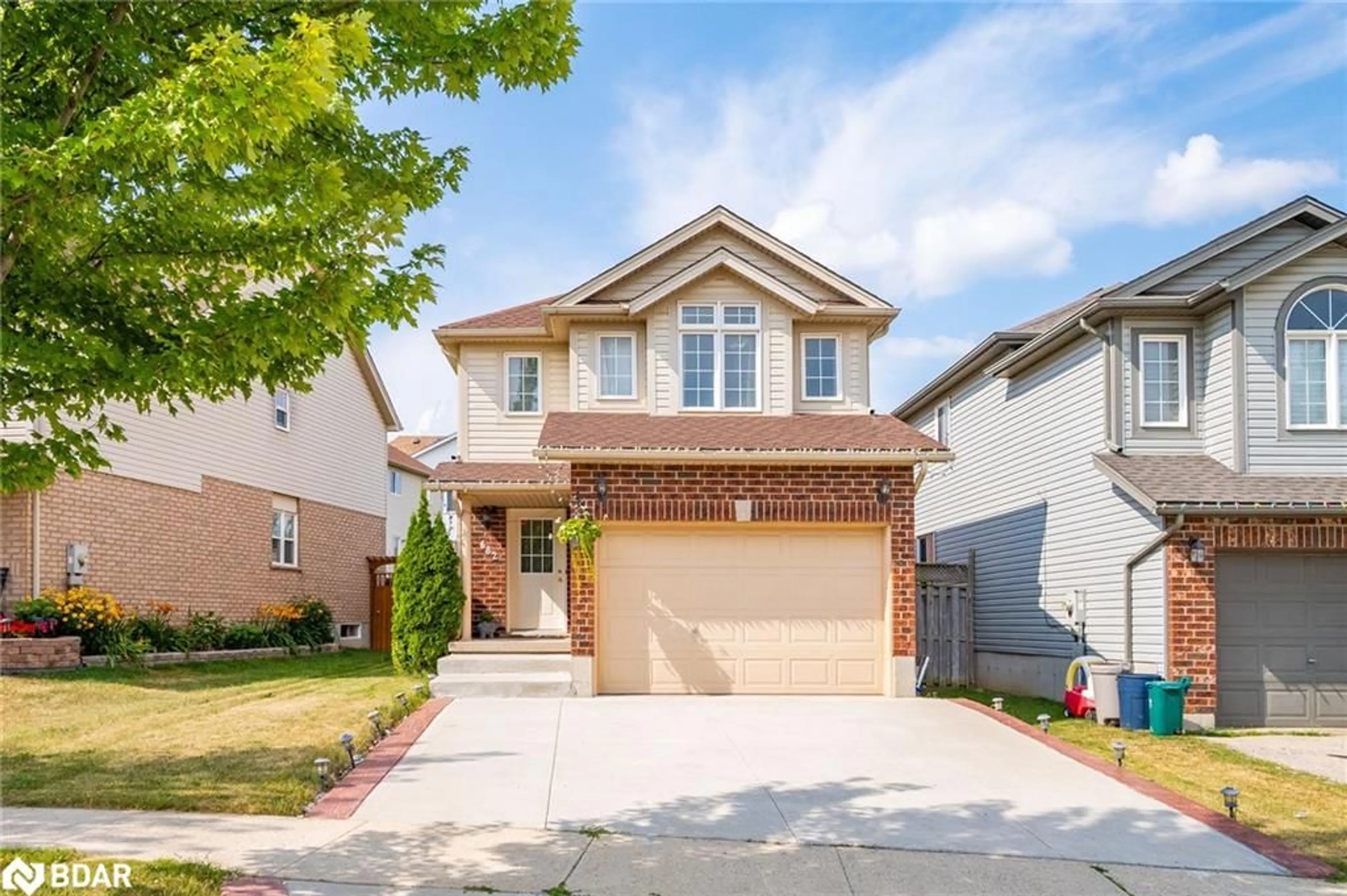 Home with vinyl exterior material, street for 682 Activa Ave, Kitchener Ontario N2E 4E1