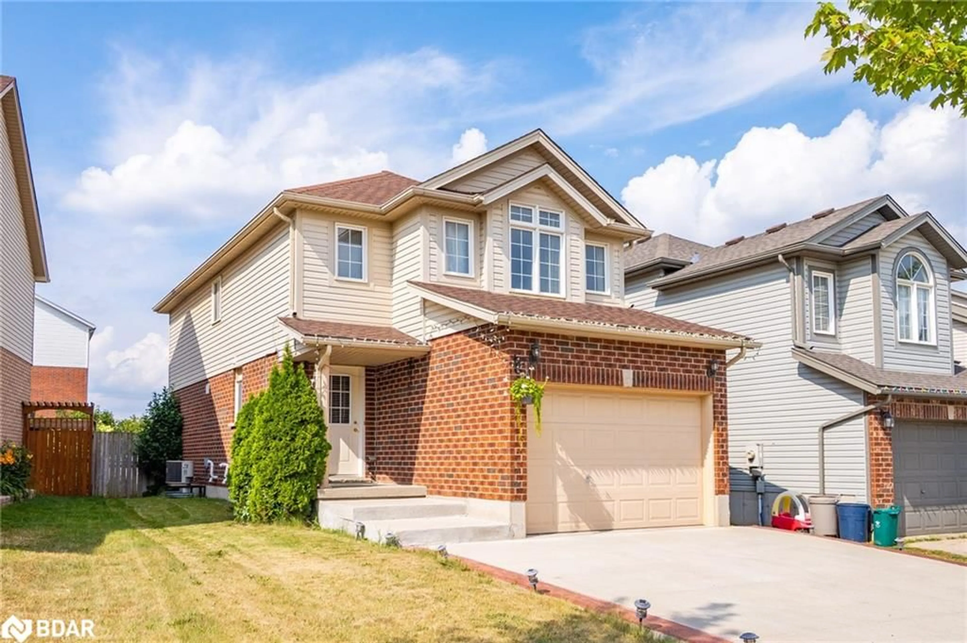 Home with brick exterior material, street for 682 Activa Ave, Kitchener Ontario N2E 4E1