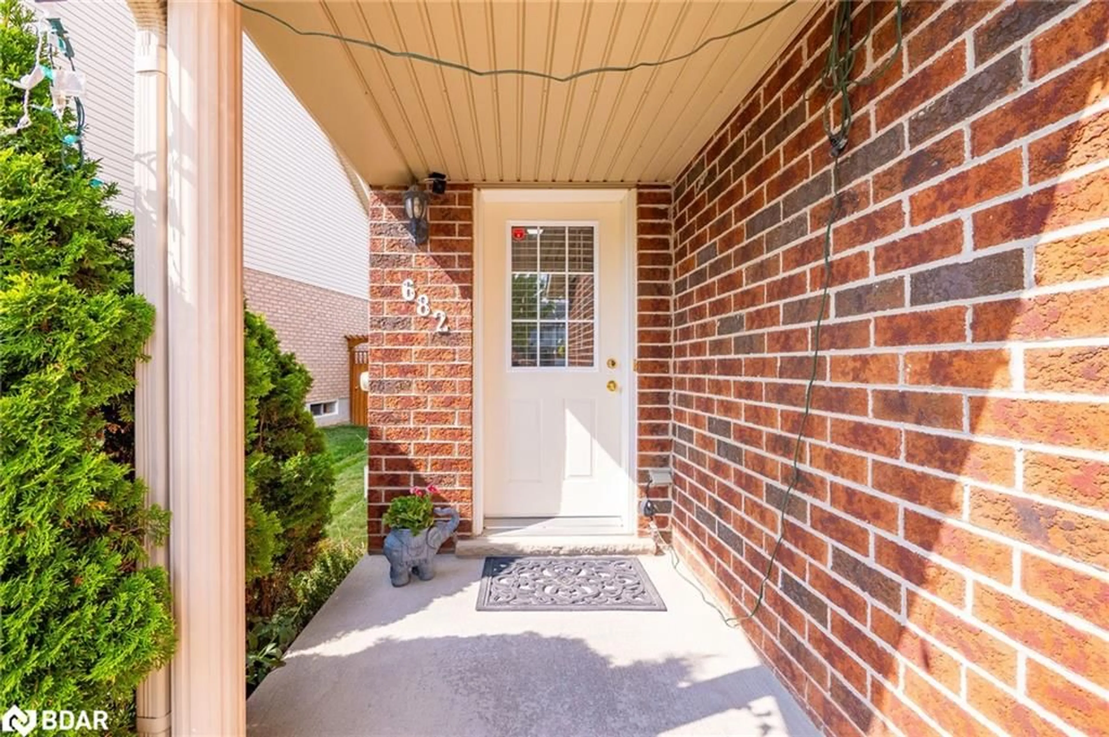 Home with brick exterior material, street for 682 Activa Ave, Kitchener Ontario N2E 4E1