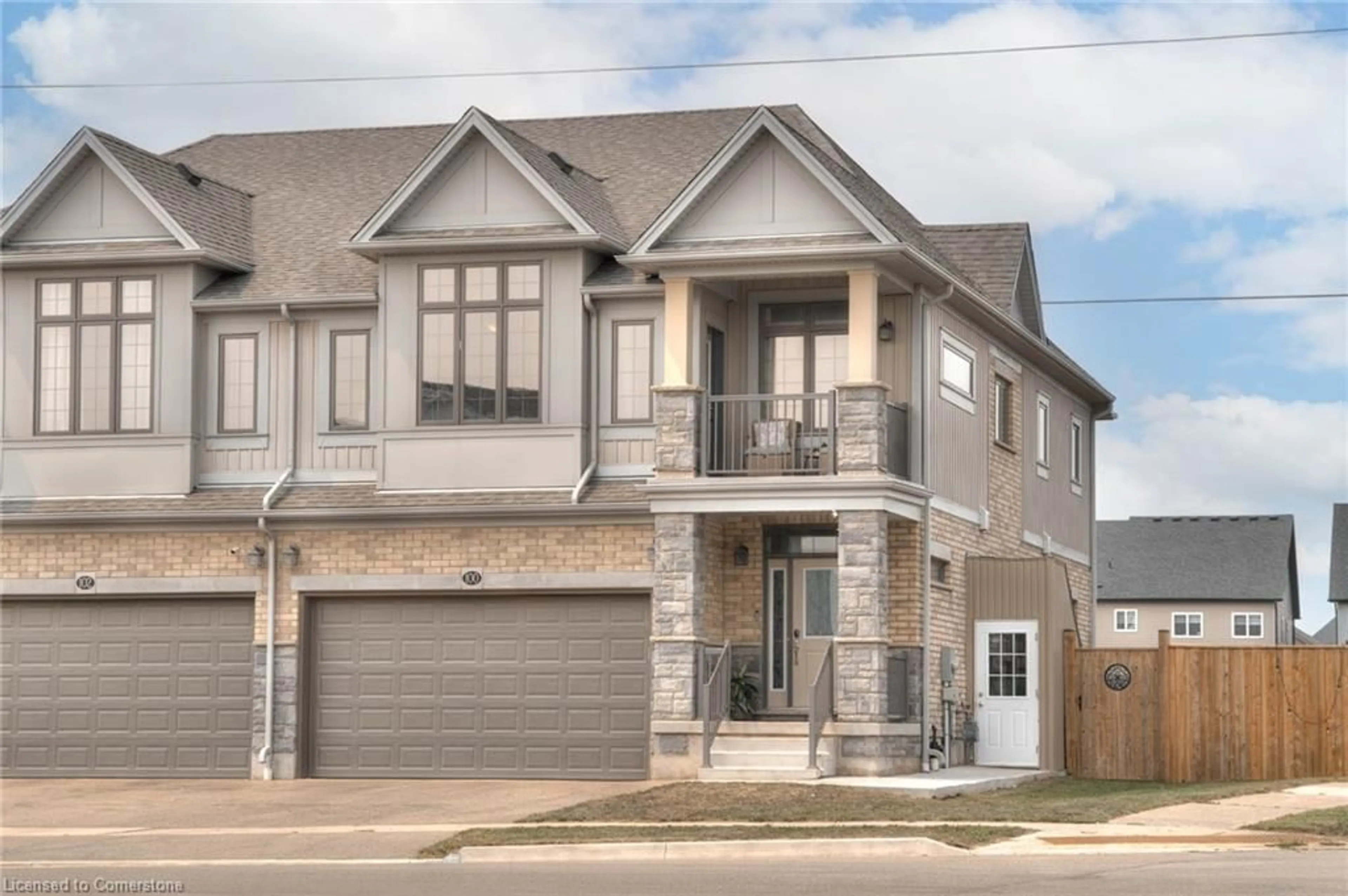 Home with brick exterior material, street for 100 Foamflower Pl, Waterloo Ontario N2V 0G9