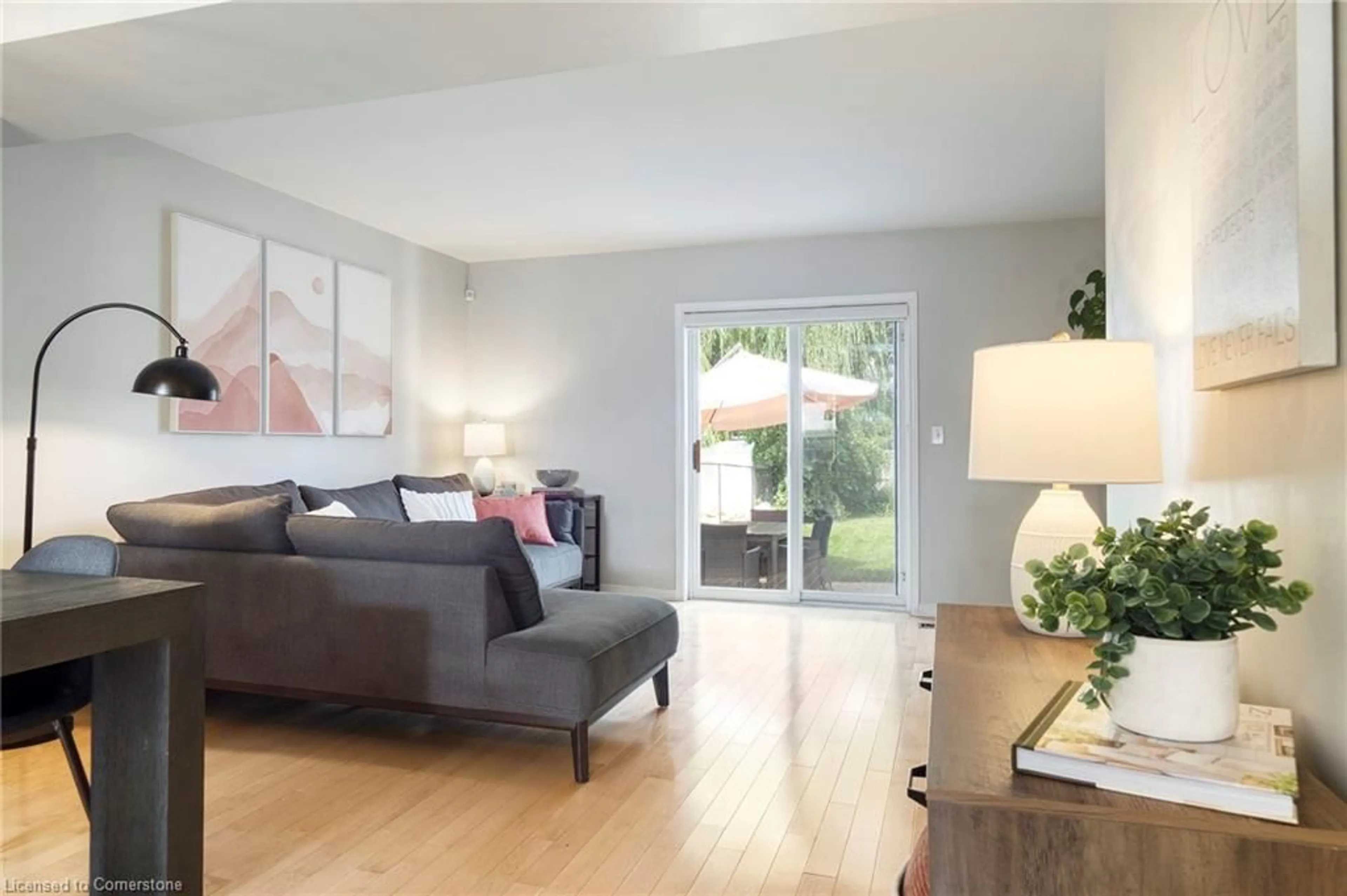 Living room with furniture, wood/laminate floor for 7 Southcreek Trail, Guelph Ontario N1G 4Y8
