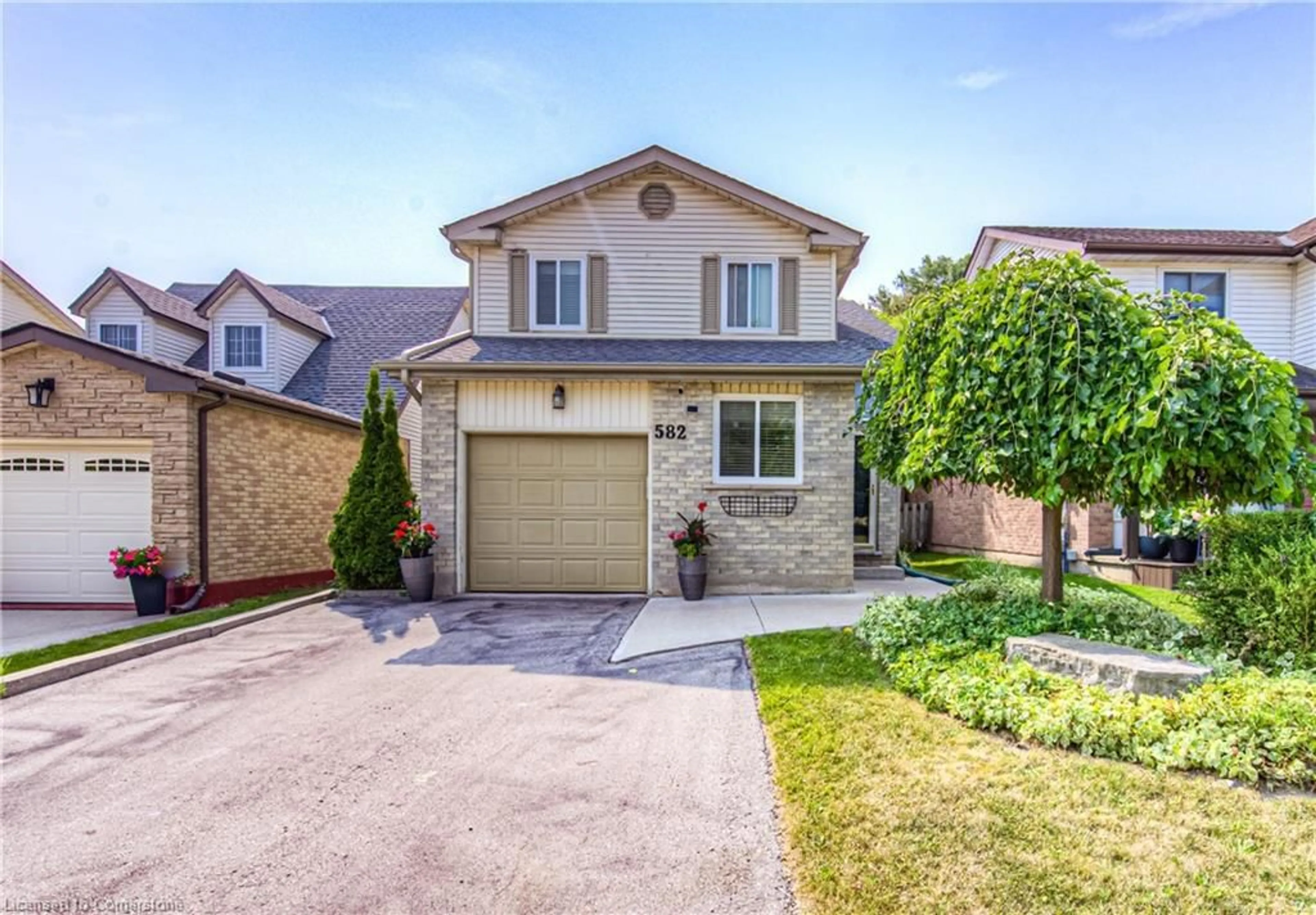 Home with brick exterior material, street for 582 Drummerhill Cres, Waterloo Ontario N2T 1G4