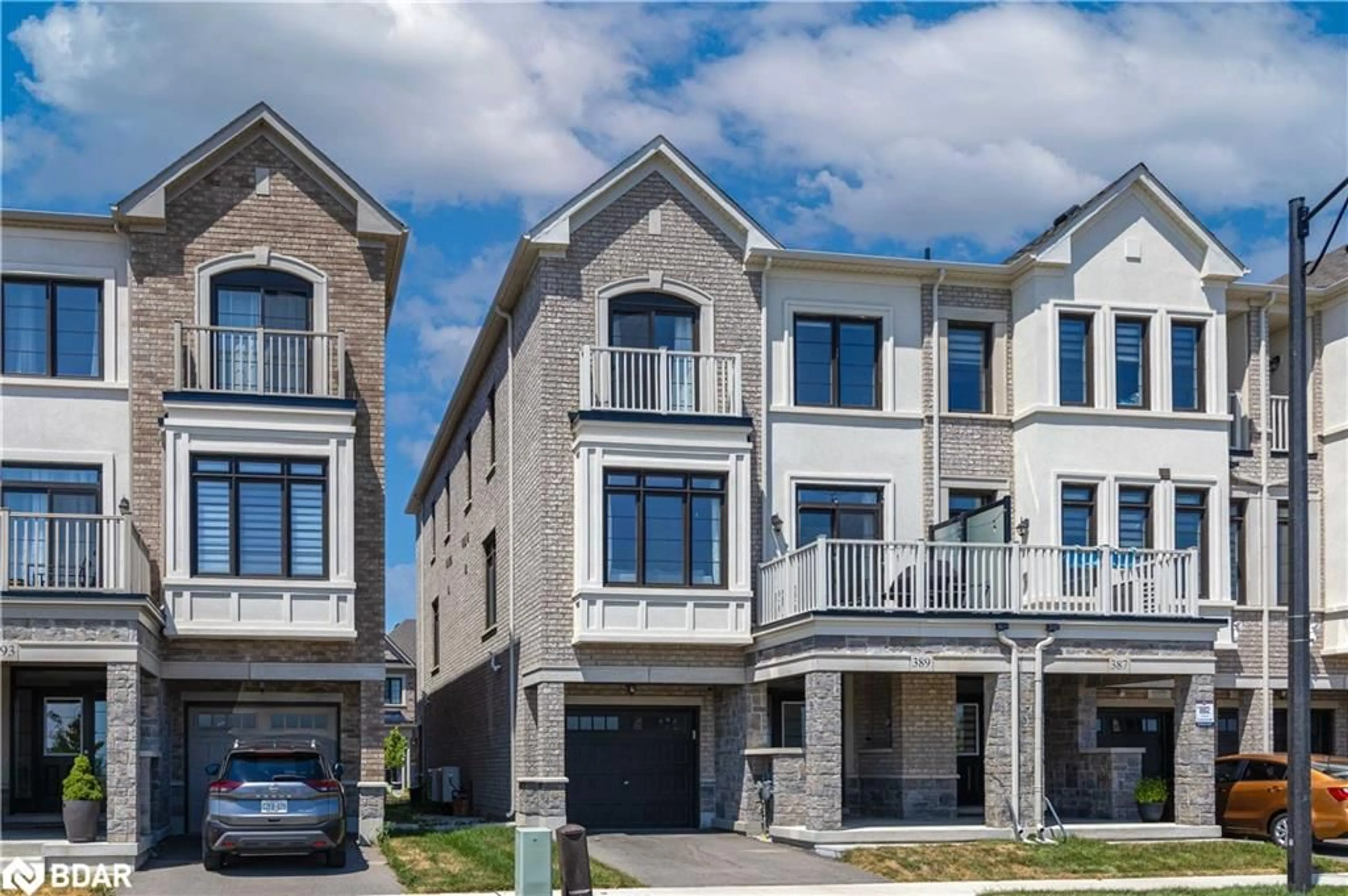 Home with brick exterior material, street for 389 Thimbleweed Court, Milton Ontario L9E 1T3
