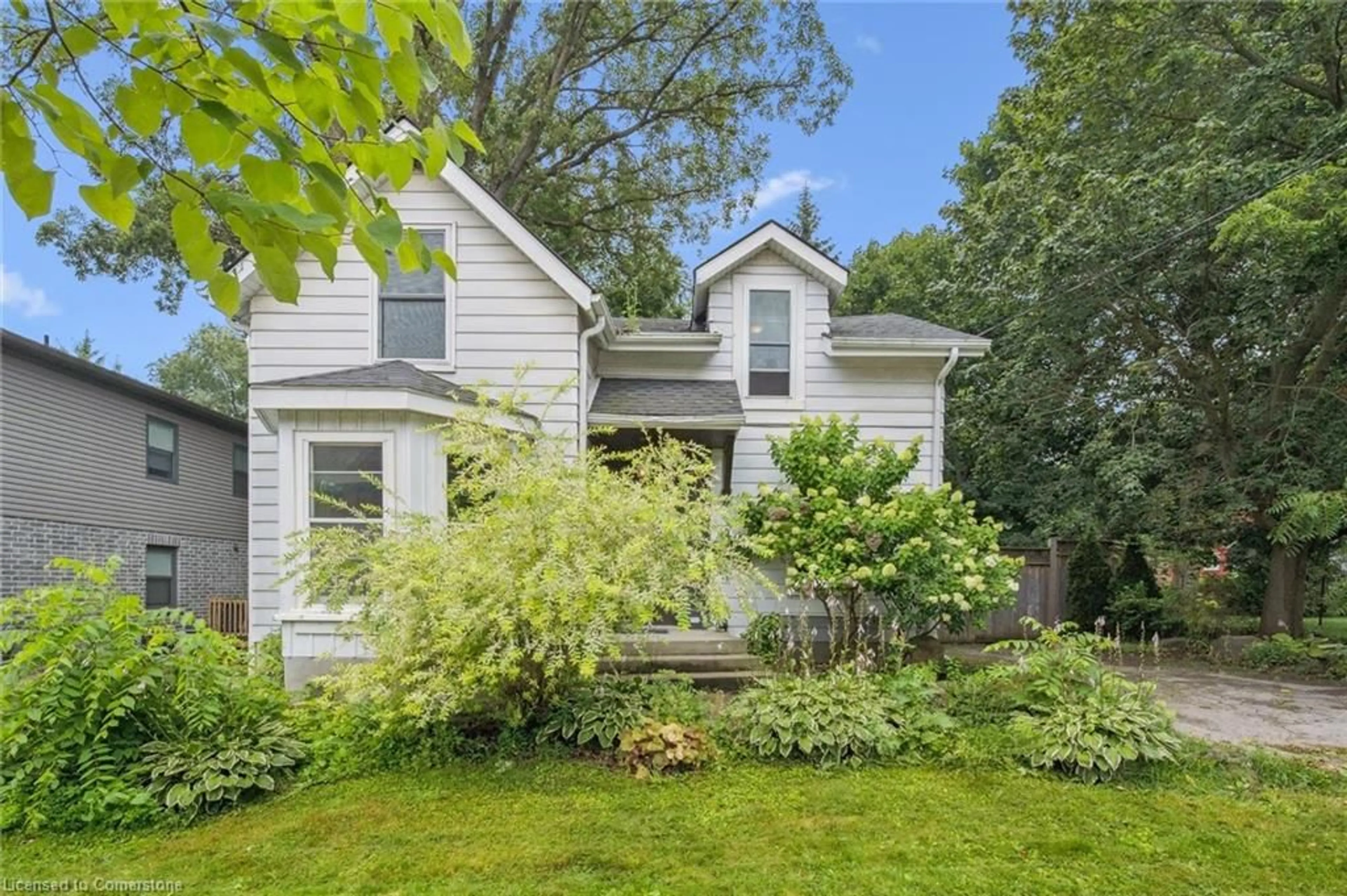 Home with vinyl exterior material, street for 49 Dublin St, Guelph Ontario N1H 4M1