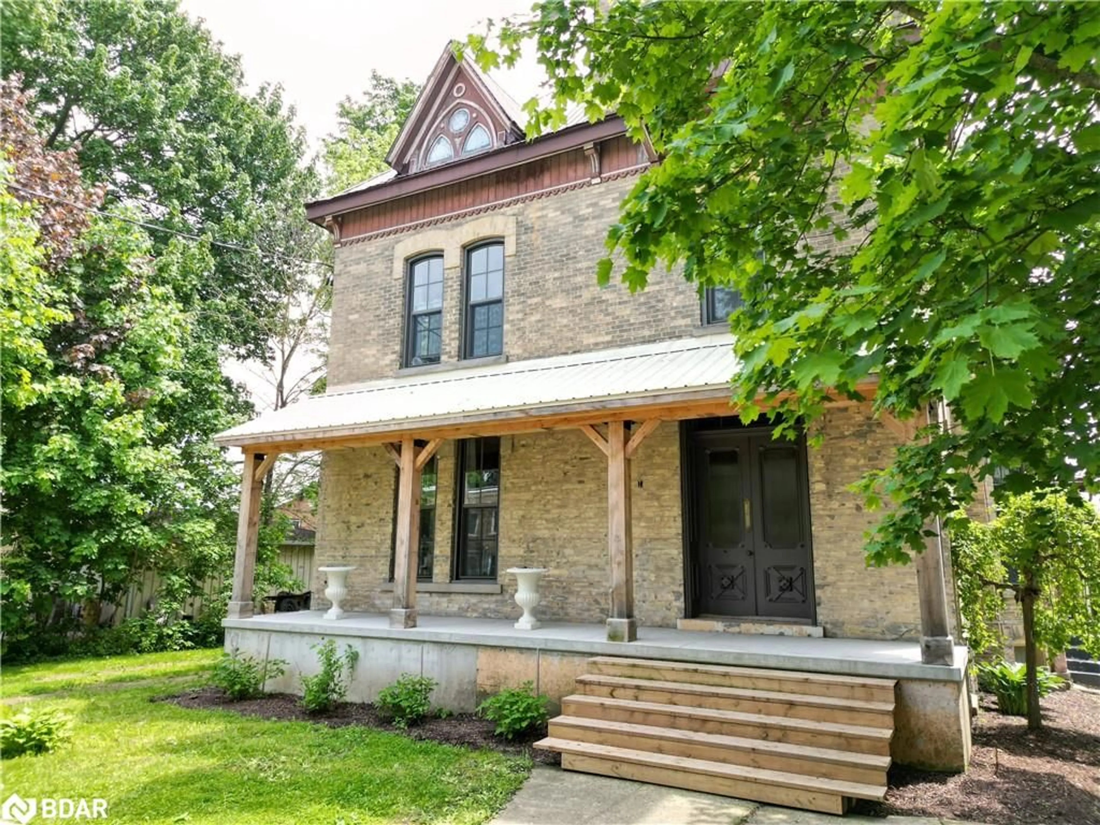 Home with brick exterior material, street for 150 Wellington St, Mount Forest Ontario N0G 2L2