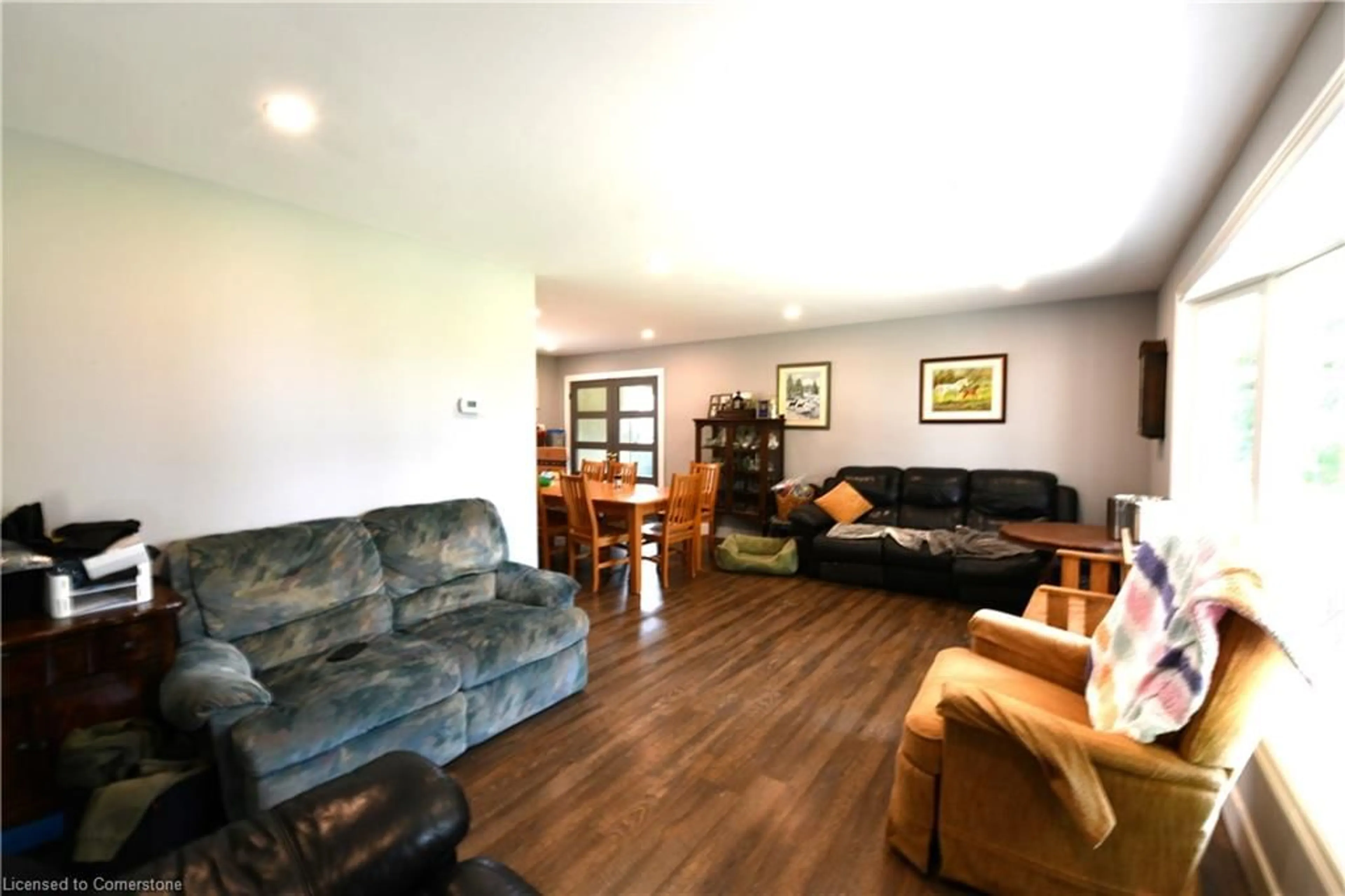 Living room with furniture, wood/laminate floor for 324 Ayr Rd, Paris Ontario N3L 3E2