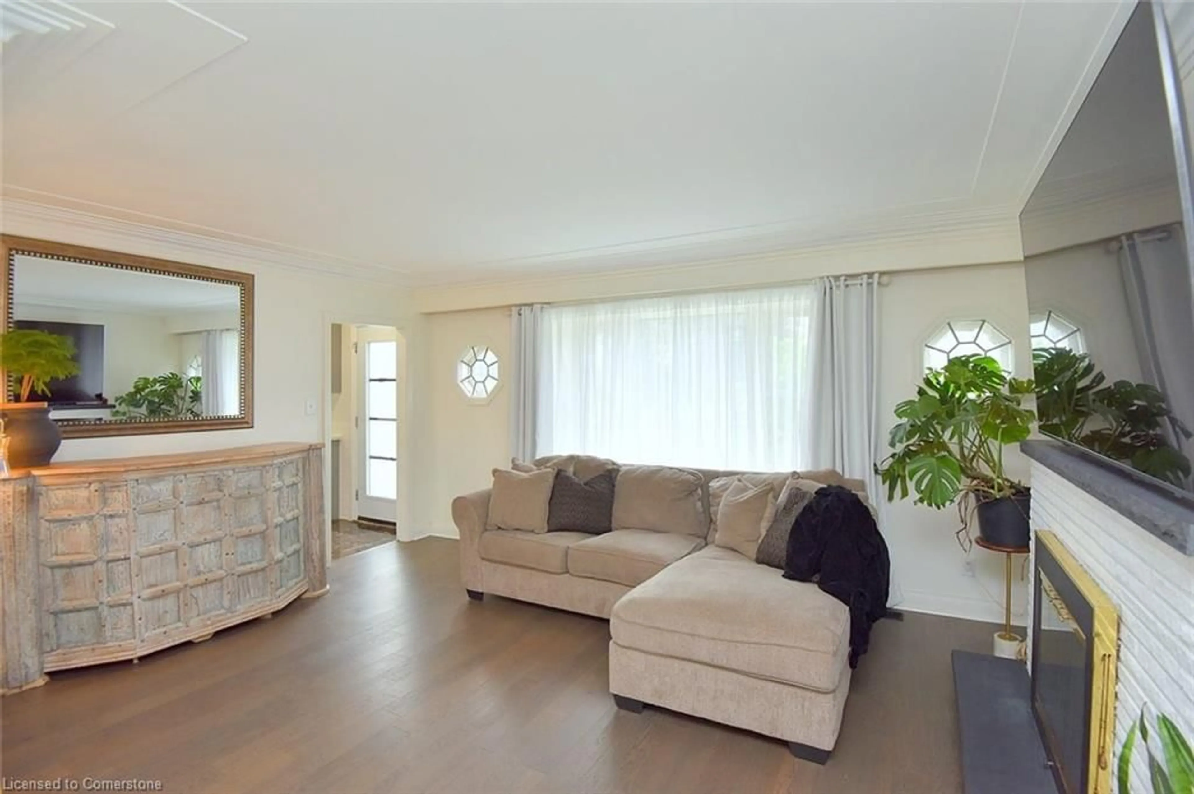 Living room with furniture, wood/laminate floor for 45 Dunkirk Dr, Hamilton Ontario L8K 4W9