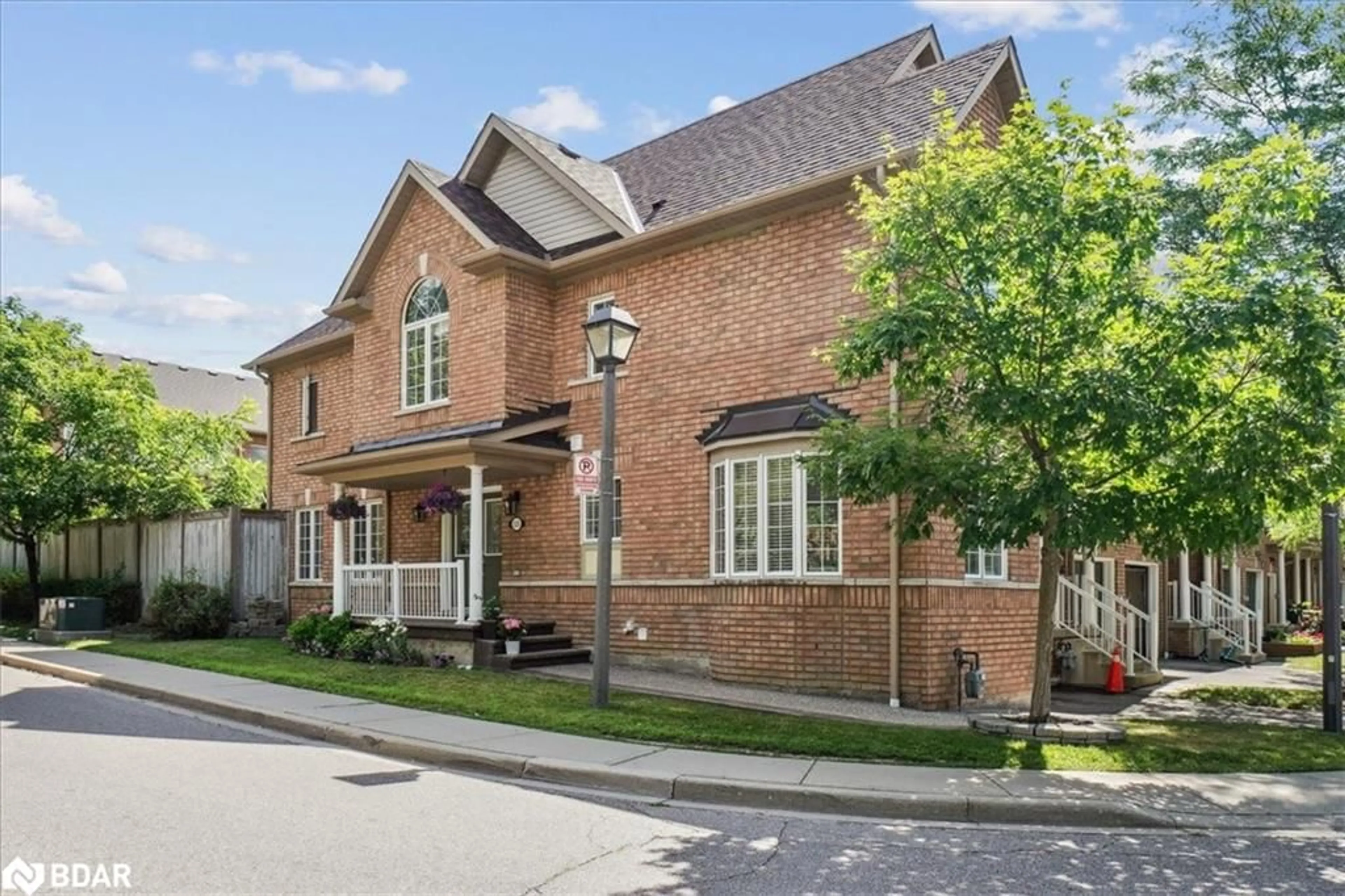 Home with brick exterior material, street for 7360 Zinnia Pl #221, Mississauga Ontario L5W 2A1