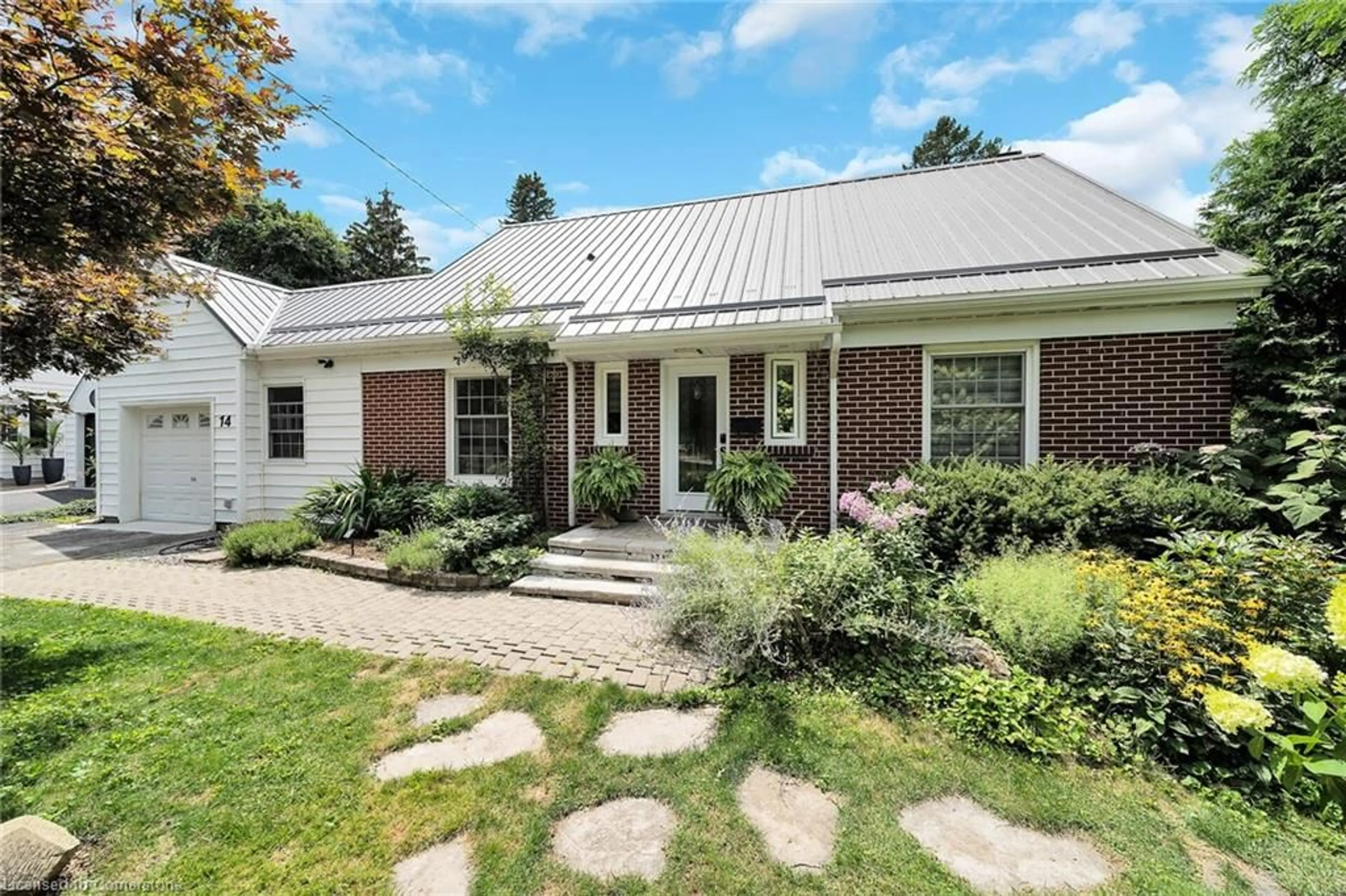Home with brick exterior material, street for 14 Simcoe Blvd, Simcoe Ontario N3Y 3L5