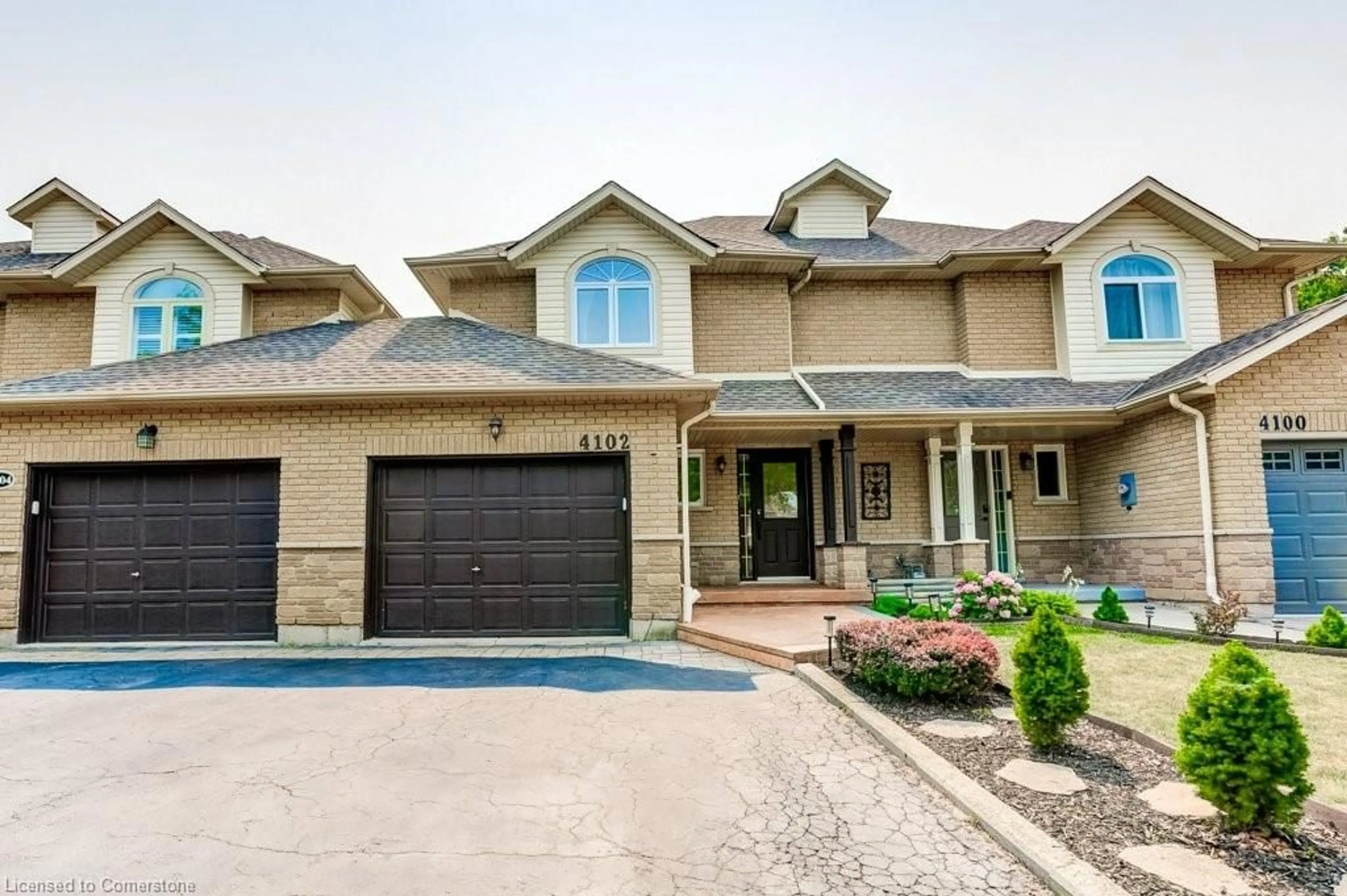 Home with brick exterior material, street for 4102 Foxwood Dr, Burlington Ontario L7M 4L3