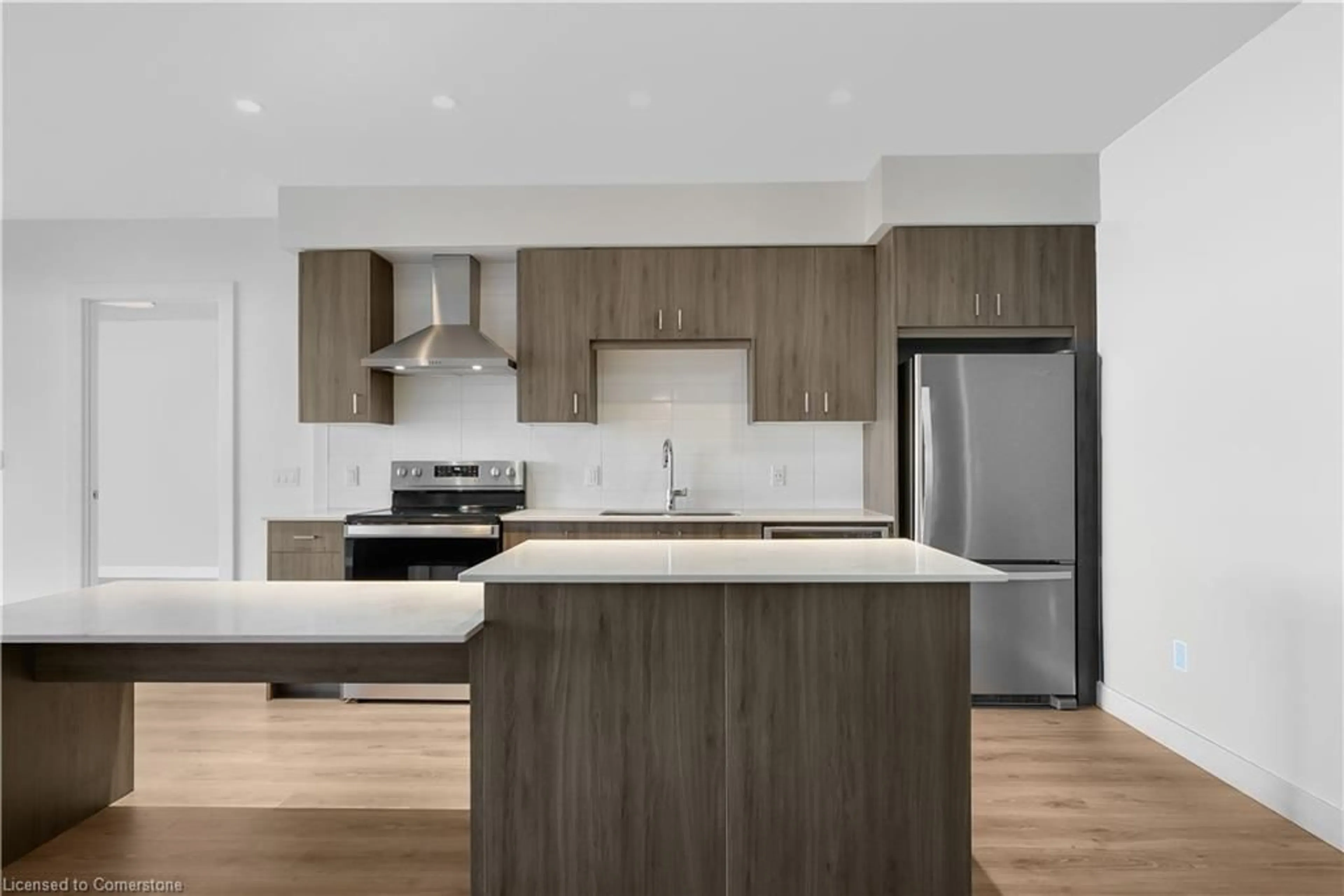 Open concept kitchen, wood/laminate floor for 15 Glebe St #710, Cambridge Ontario N1S 0C3