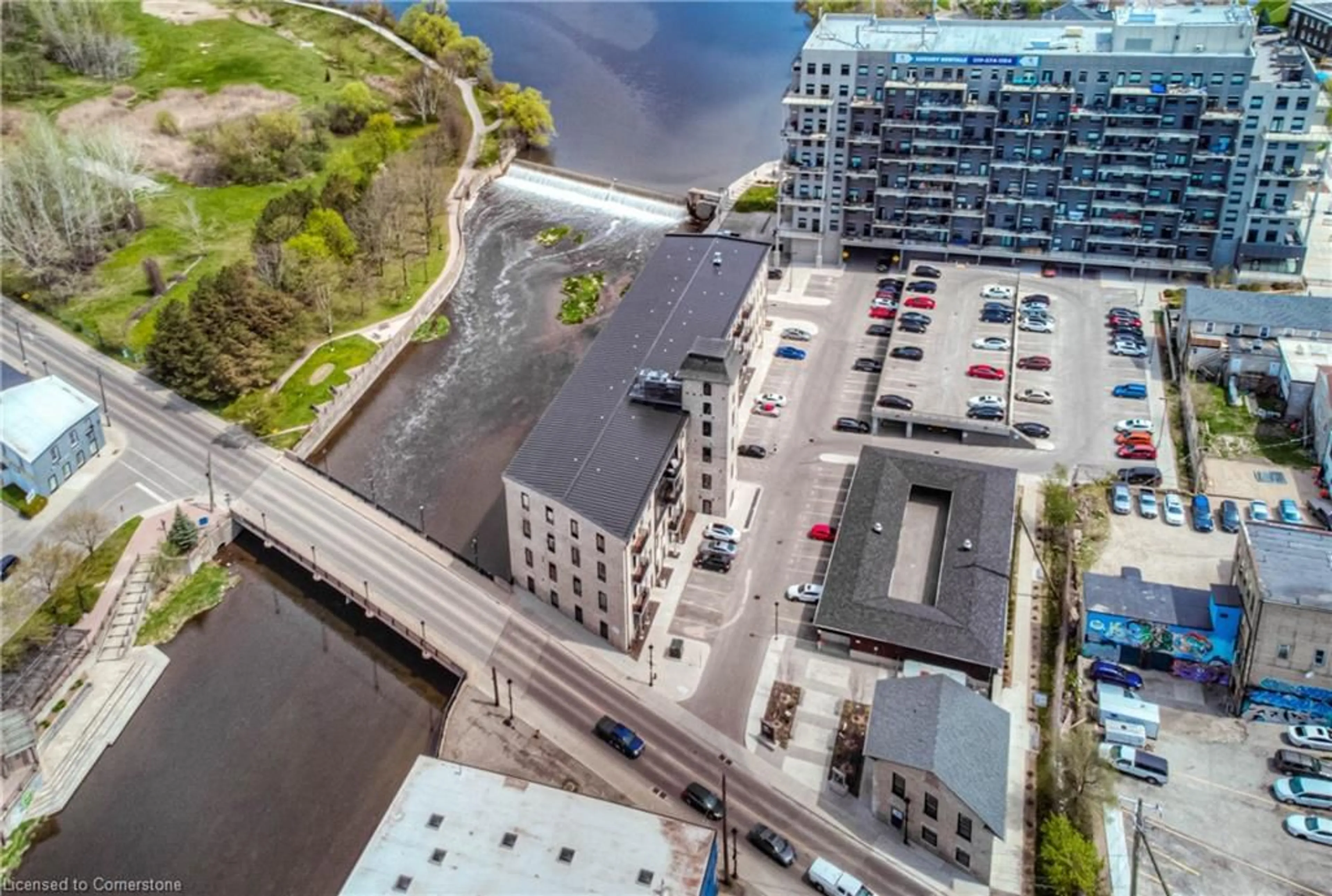 A pic from outside/outdoor area/front of a property/back of a property/a pic from drone, city buildings view from balcony for 19 Guelph Ave #107, Cambridge Ontario N3C 1A2
