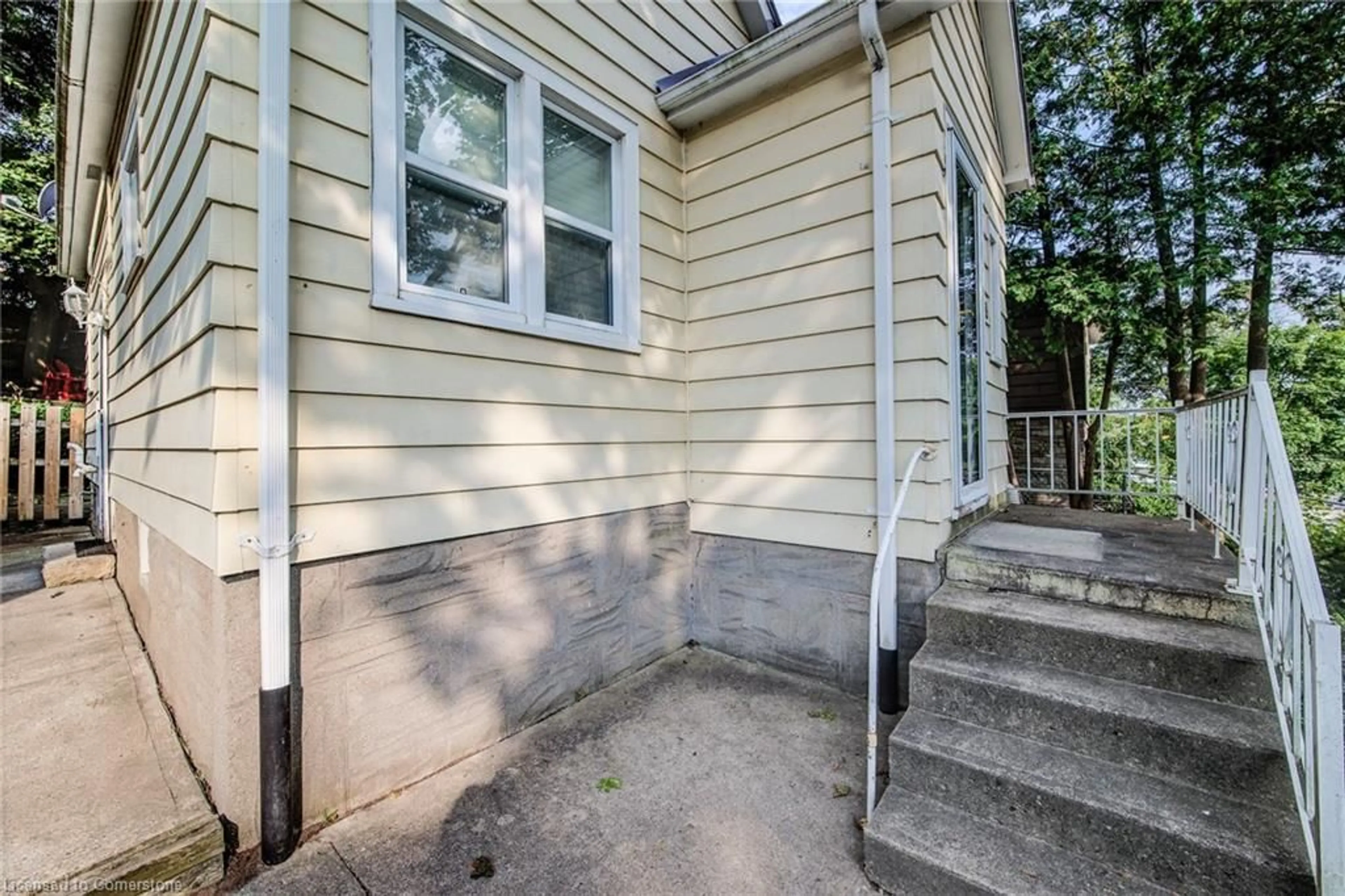 Home with vinyl exterior material, street for 19 Chestnut St, Kitchener Ontario N2H 1T6