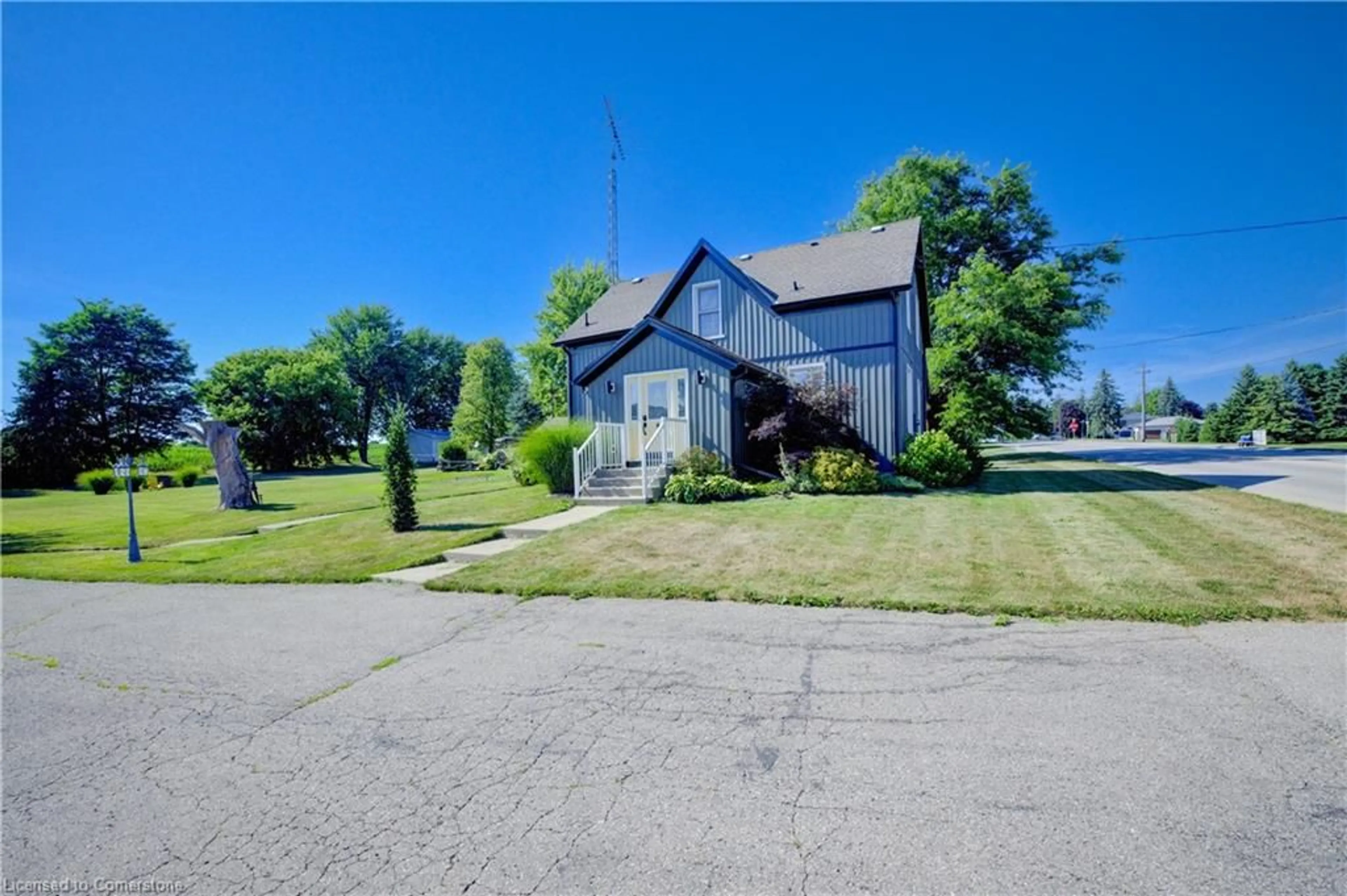 A pic from outside/outdoor area/front of a property/back of a property/a pic from drone, street for 4670 Perth Rd 107 Rd, Perth East Ontario N5A 6S2
