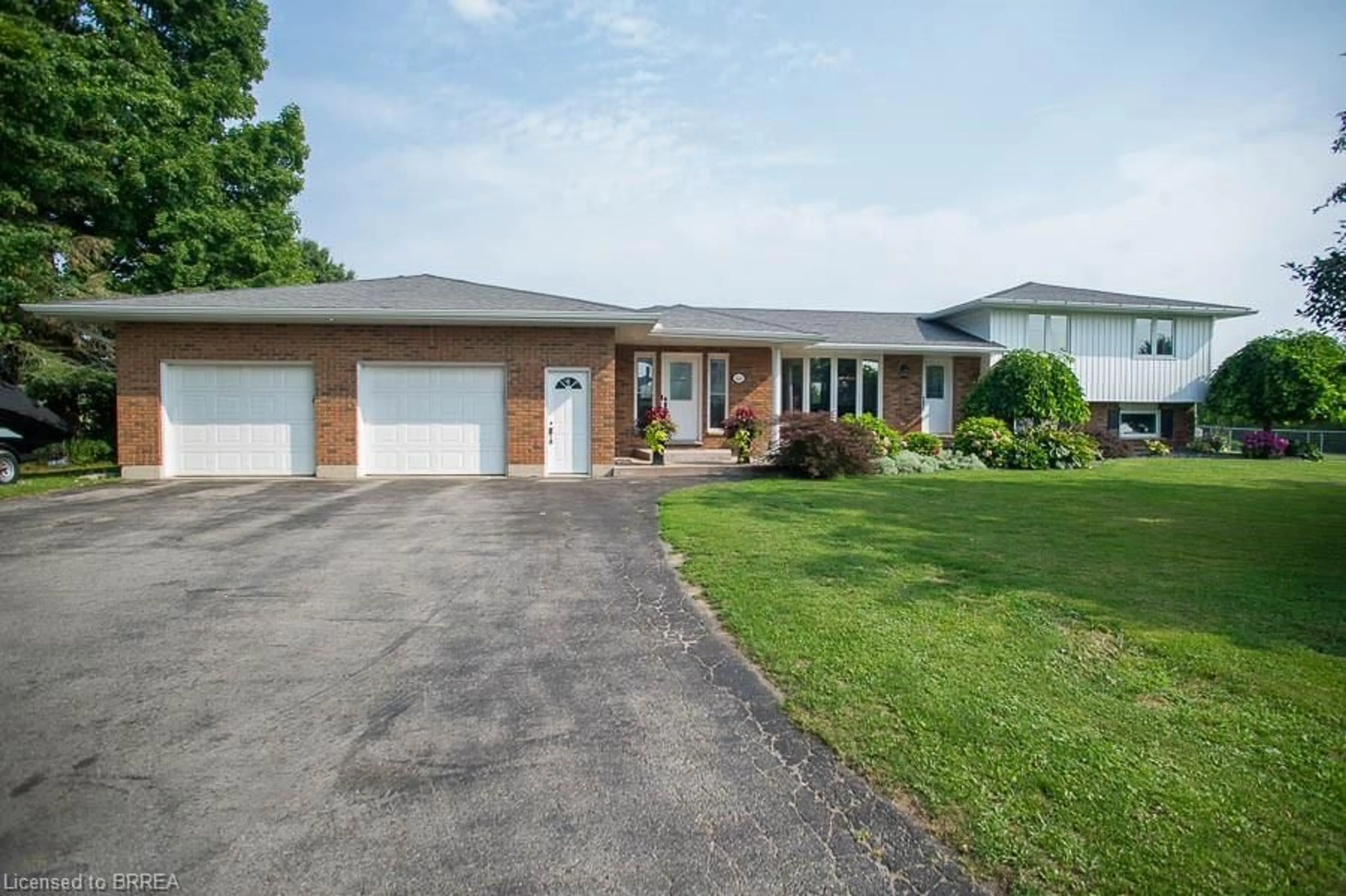 A pic from outside/outdoor area/front of a property/back of a property/a pic from drone, street for 1449 Windham Road 12, Simcoe Ontario N3Y 4K3