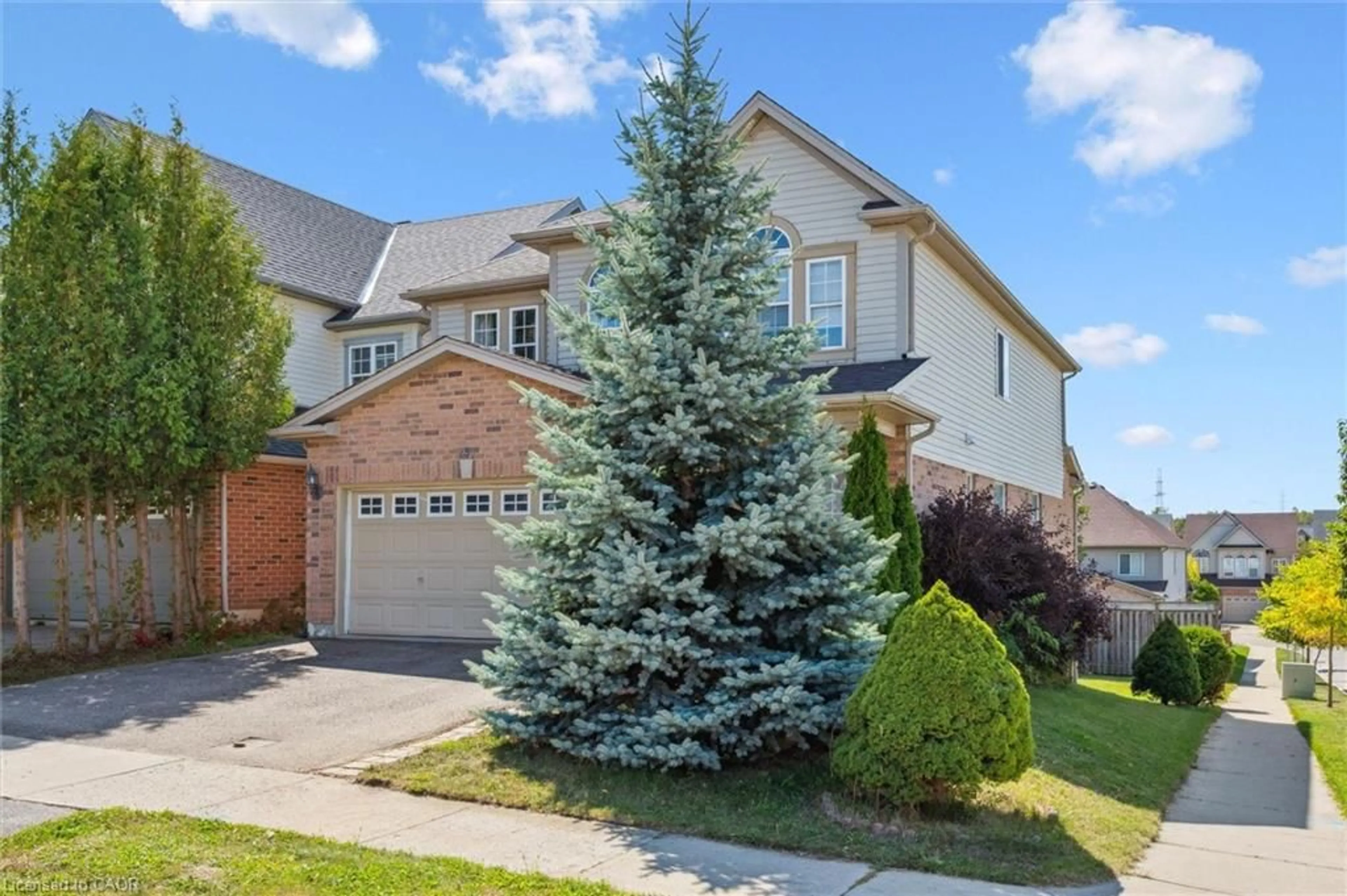 Home with brick exterior material, street for 733 Karlsfeld Rd, Waterloo Ontario N2T 2W4