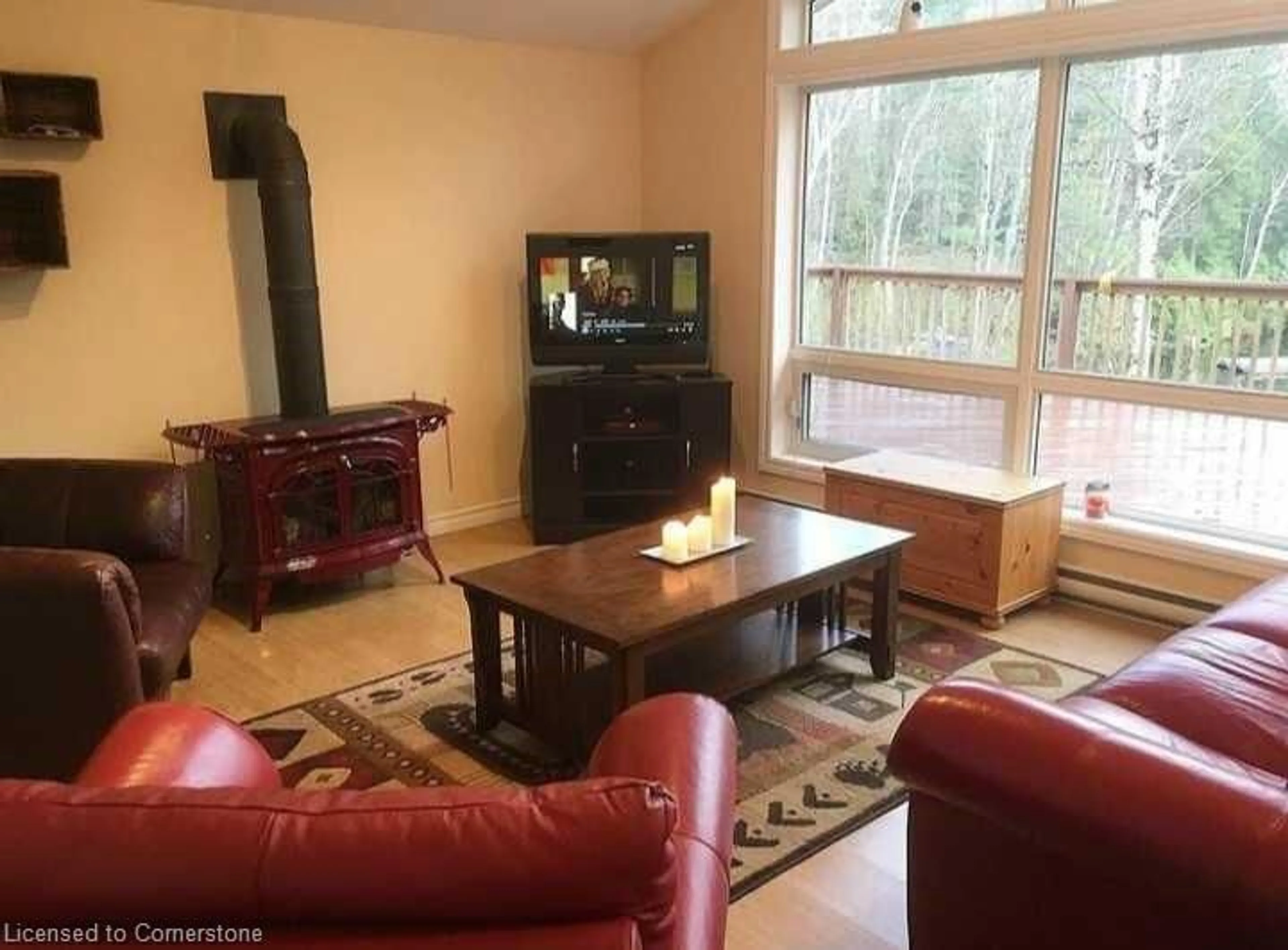 Living room with furniture, wood/laminate floor for 204 Jennison Rd, Gilmour Ontario K0L 1W0