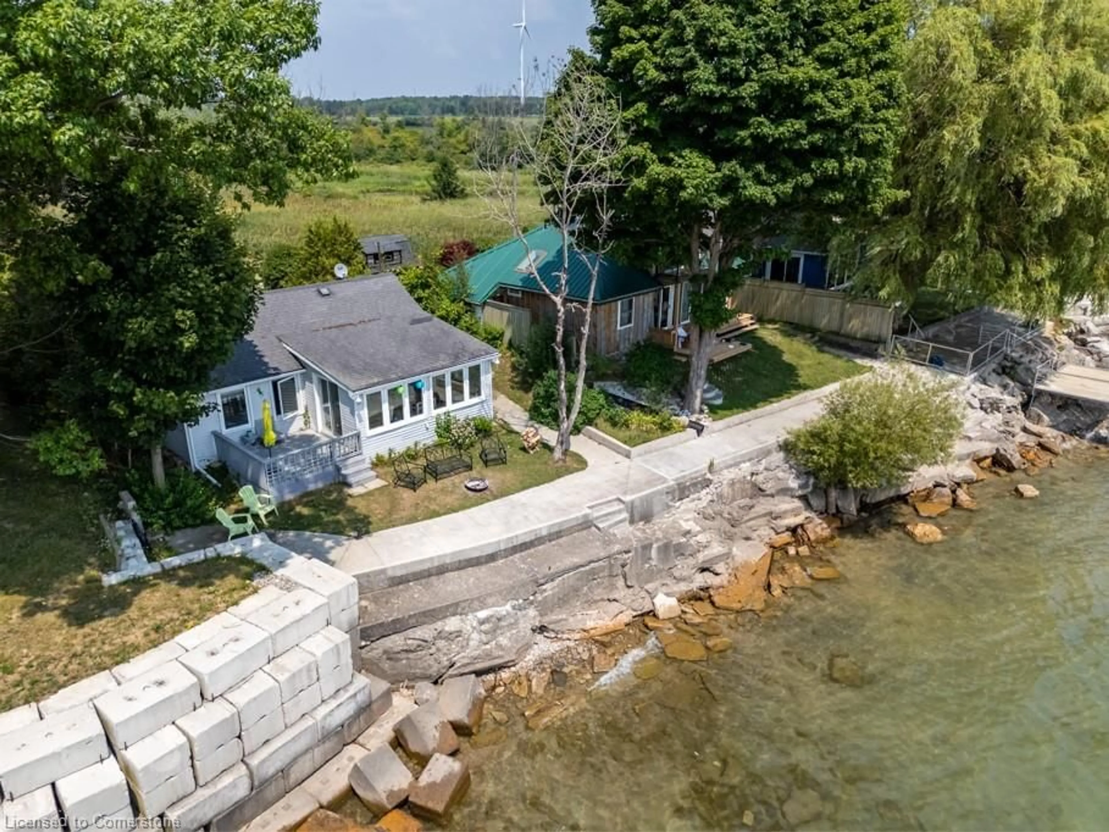 A pic from outside/outdoor area/front of a property/back of a property/a pic from drone, water/lake/river/ocean view for 2110 Lakeshore Rd, Dunnville Ontario N1A 2W8