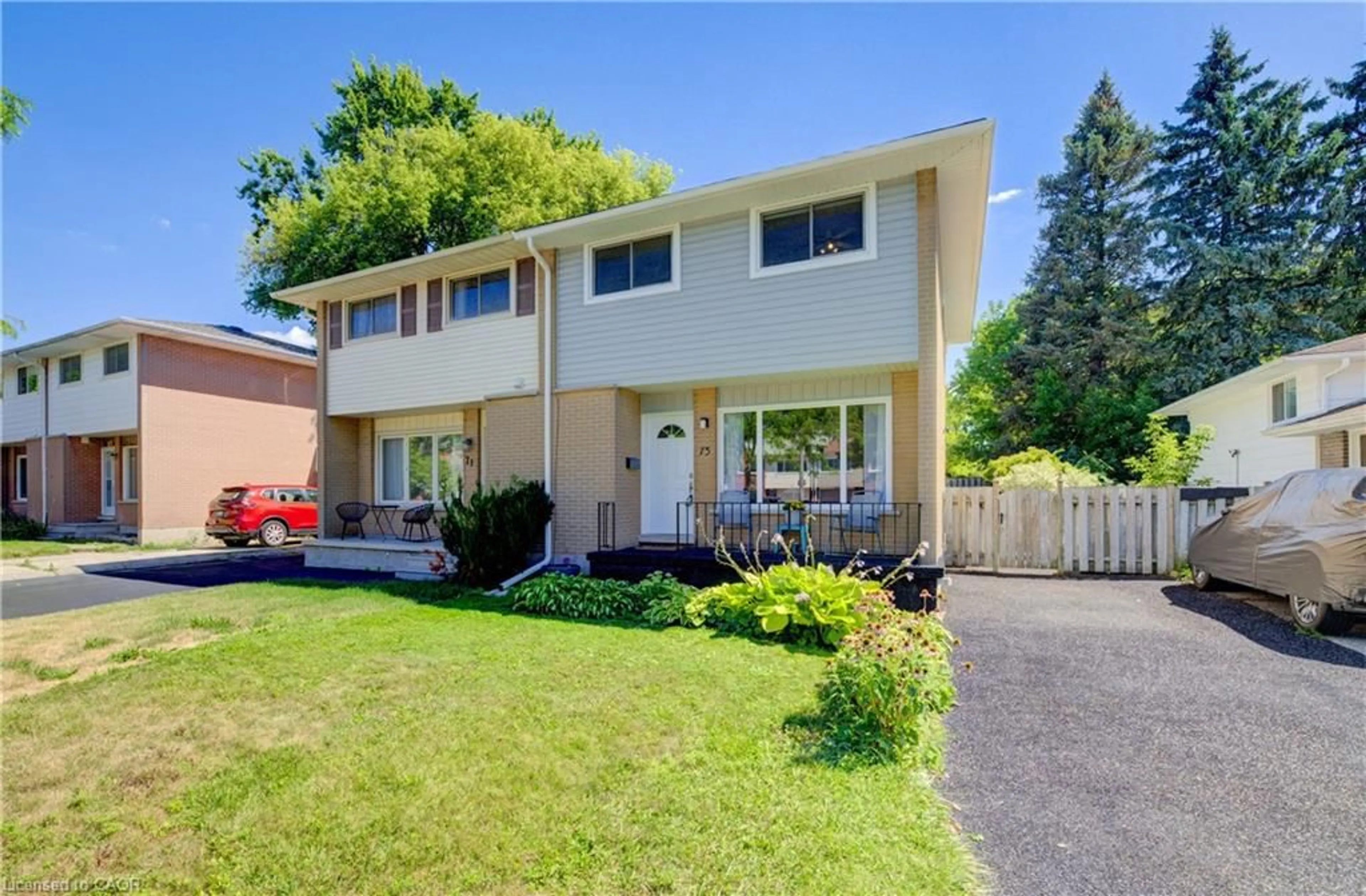 Home with vinyl exterior material, street for 73 Overlea Dr, Kitchener Ontario N2M 1S9