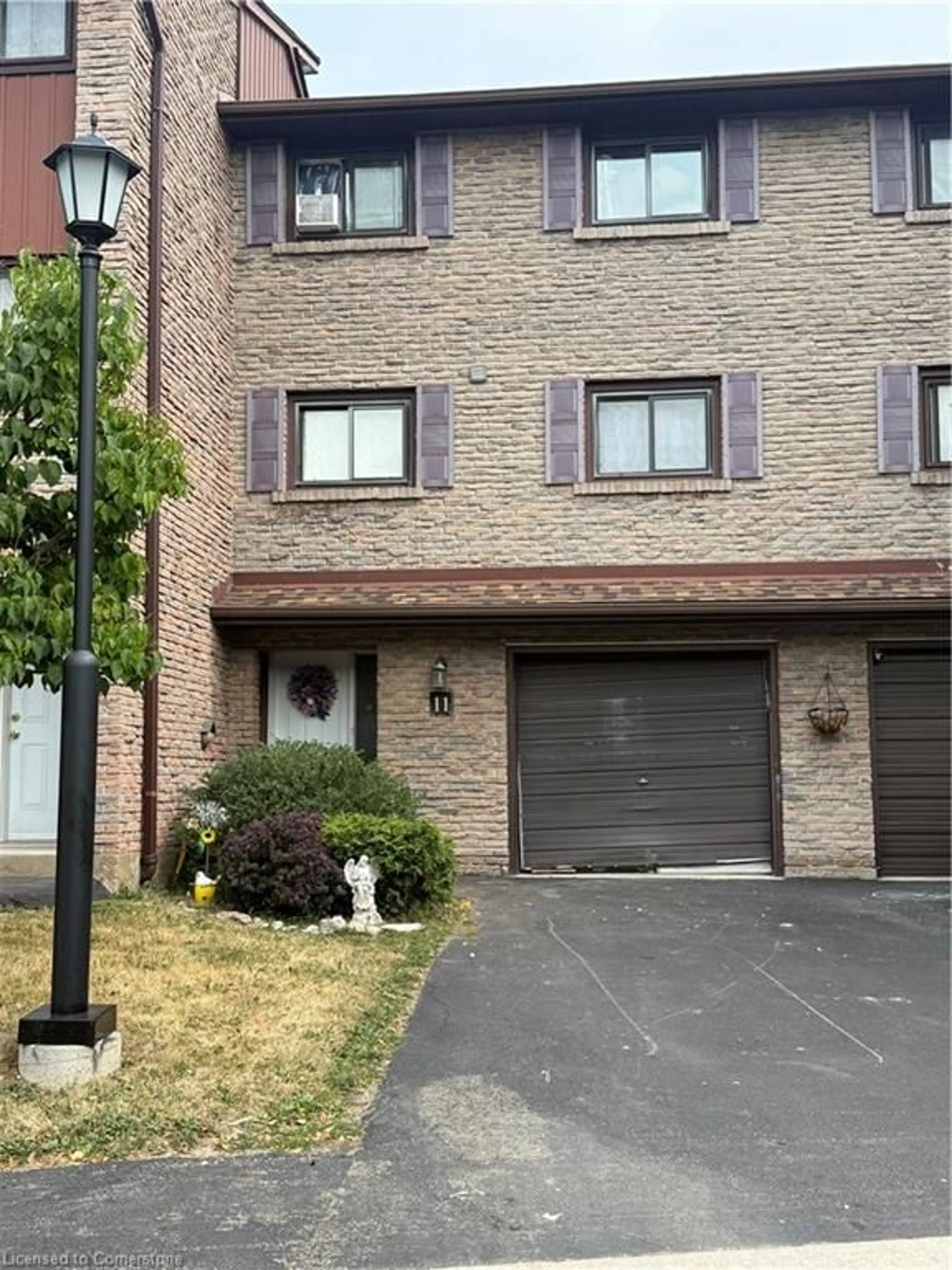 Home with brick exterior material, street for 1250 Limeridge Rd #11, Hamilton Ontario L8W 1P1