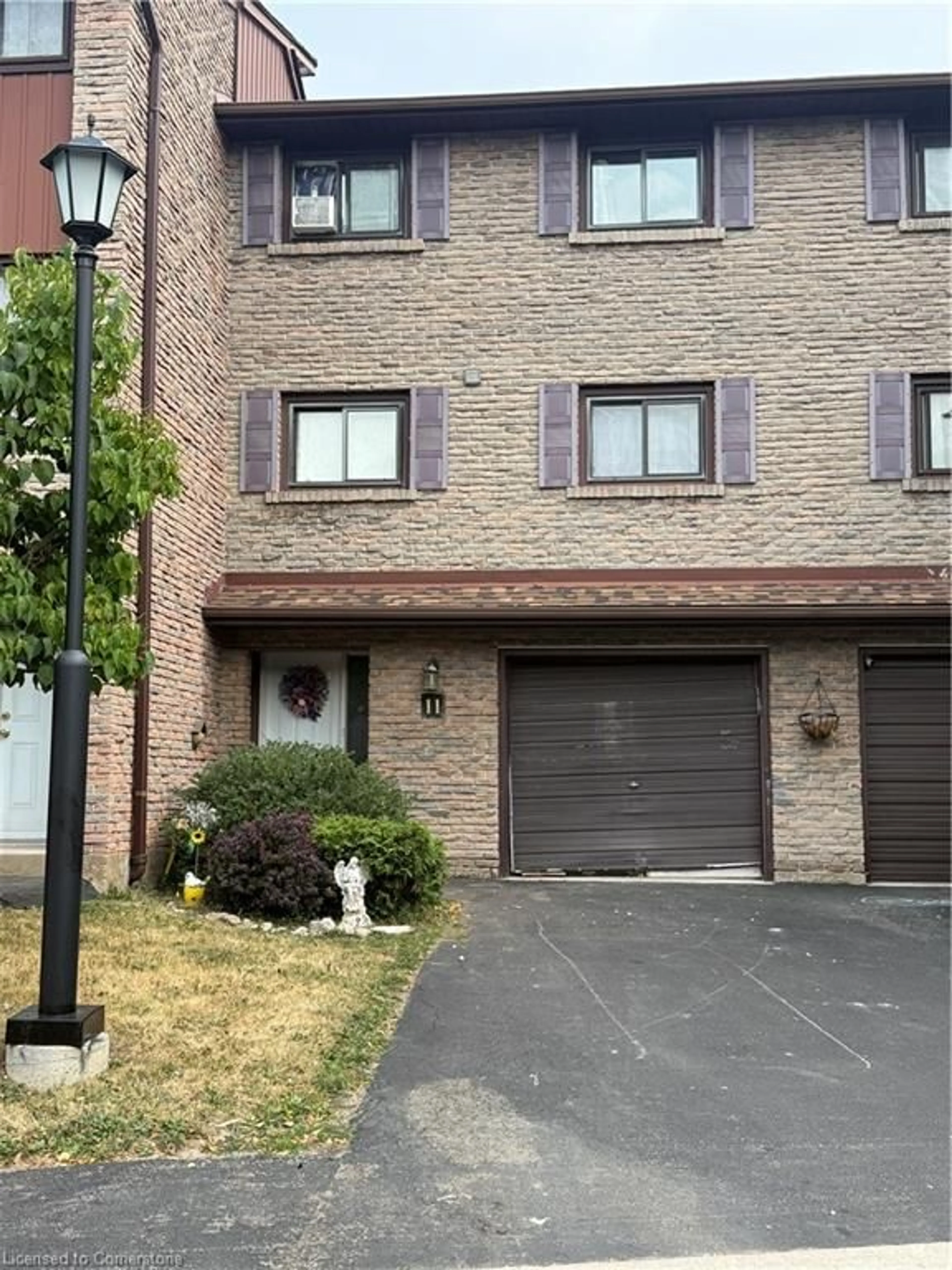 Home with brick exterior material, street for 1250 Limeridge Rd #11, Hamilton Ontario L8W 1P1