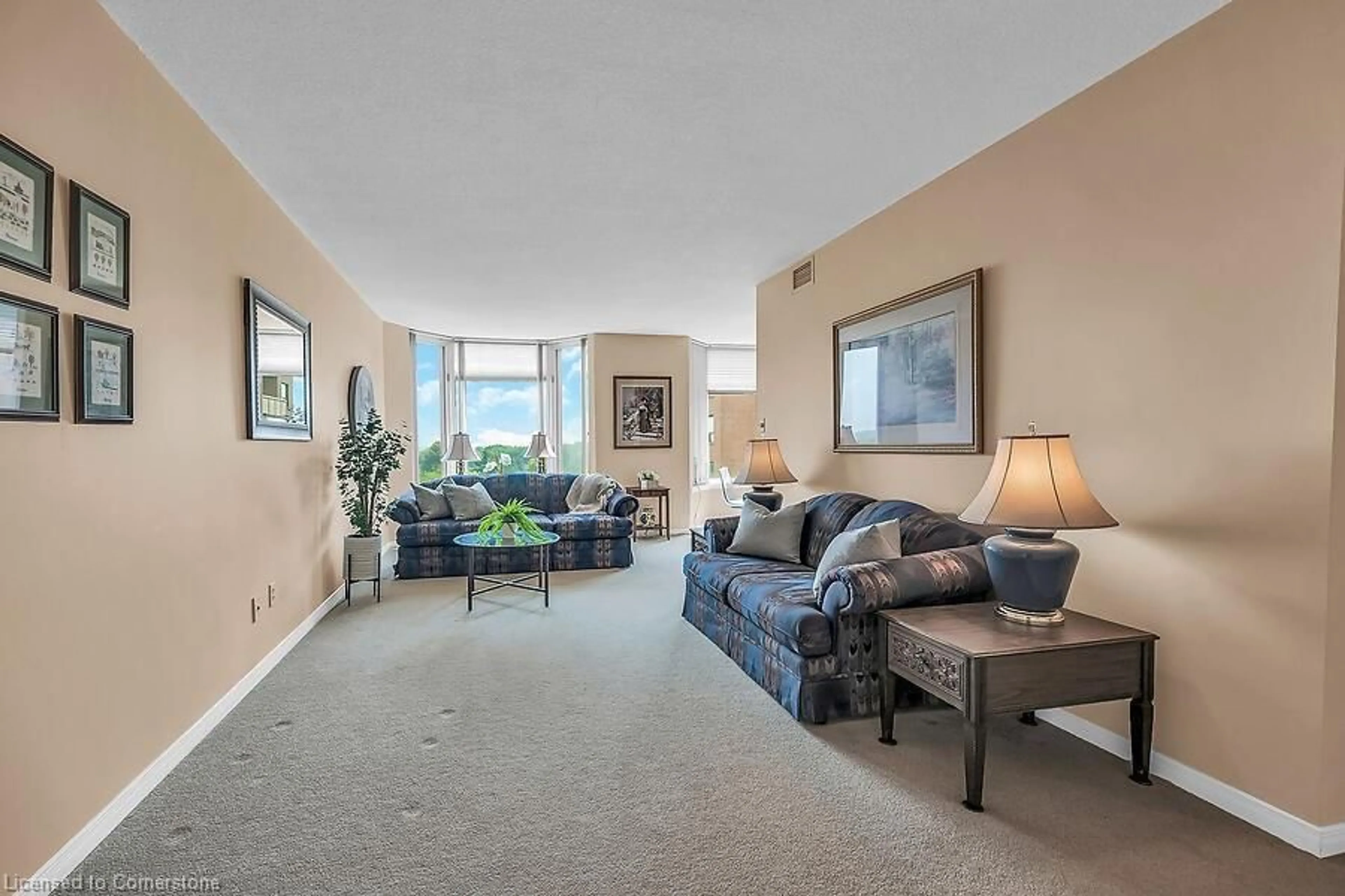 Living room with furniture, unknown for 200 Limeridge Rd #703, Hamilton Ontario L9C 7M7