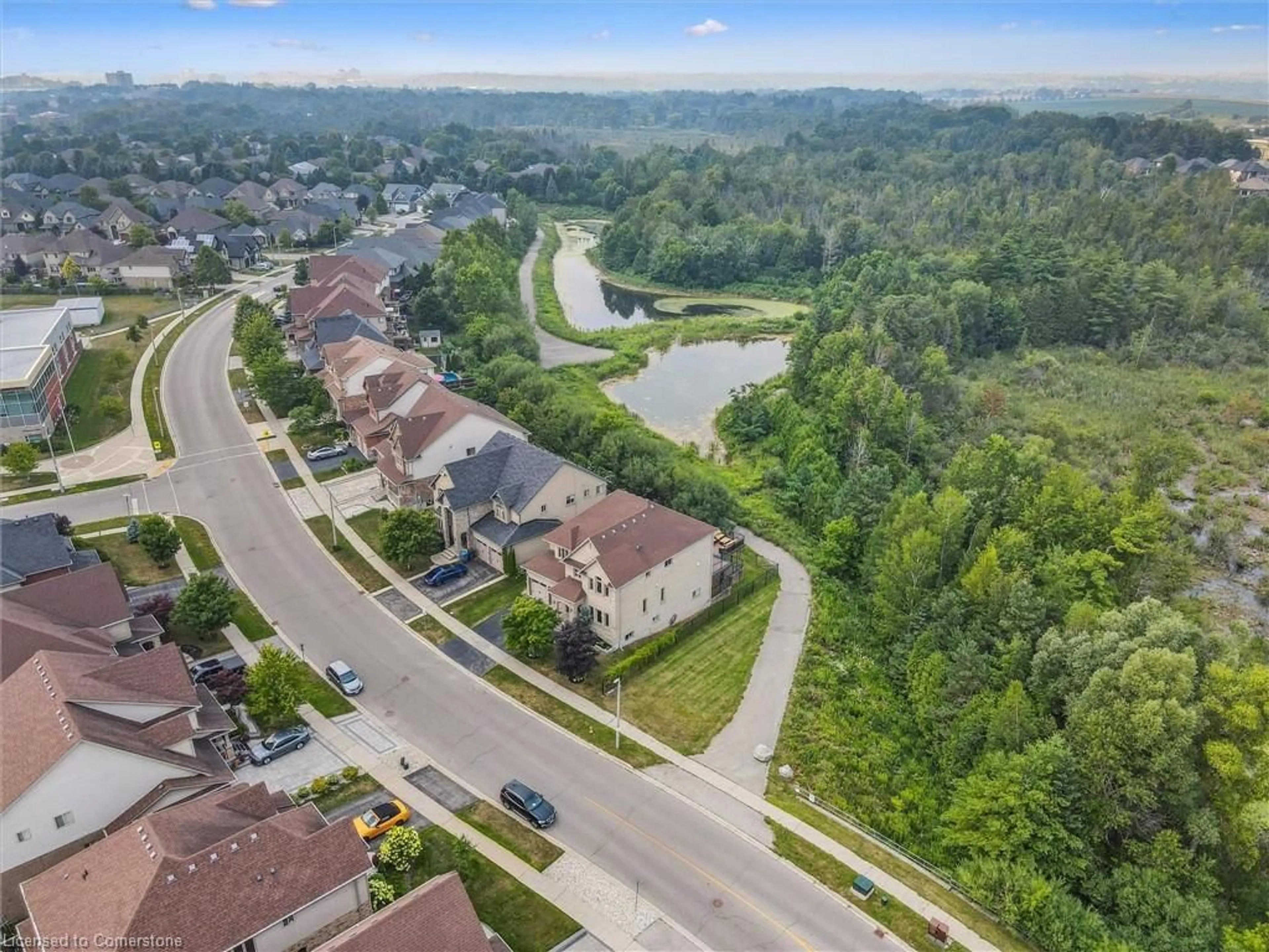 A pic from outside/outdoor area/front of a property/back of a property/a pic from drone, street for 76 Zaduk Pl, Guelph Ontario N1G 0C5