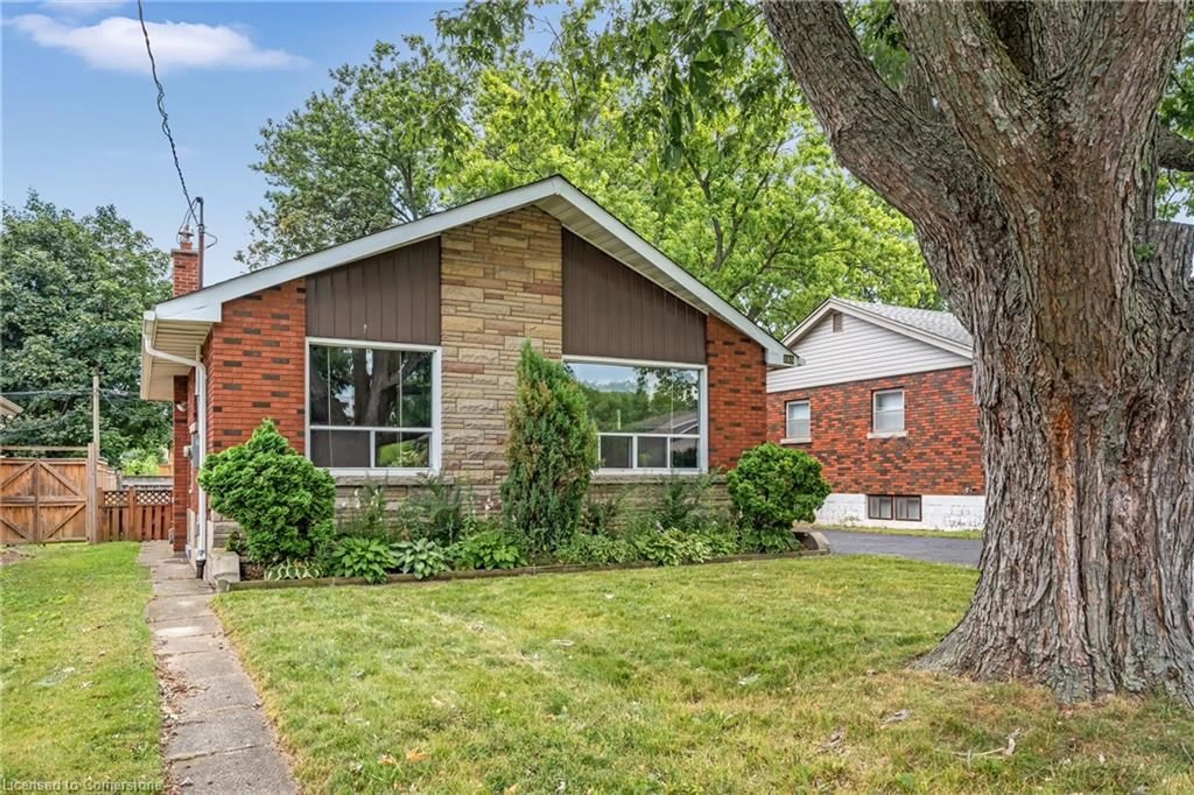Home with brick exterior material, street for 165 West 27th St, Hamilton Ontario L9C 5A5