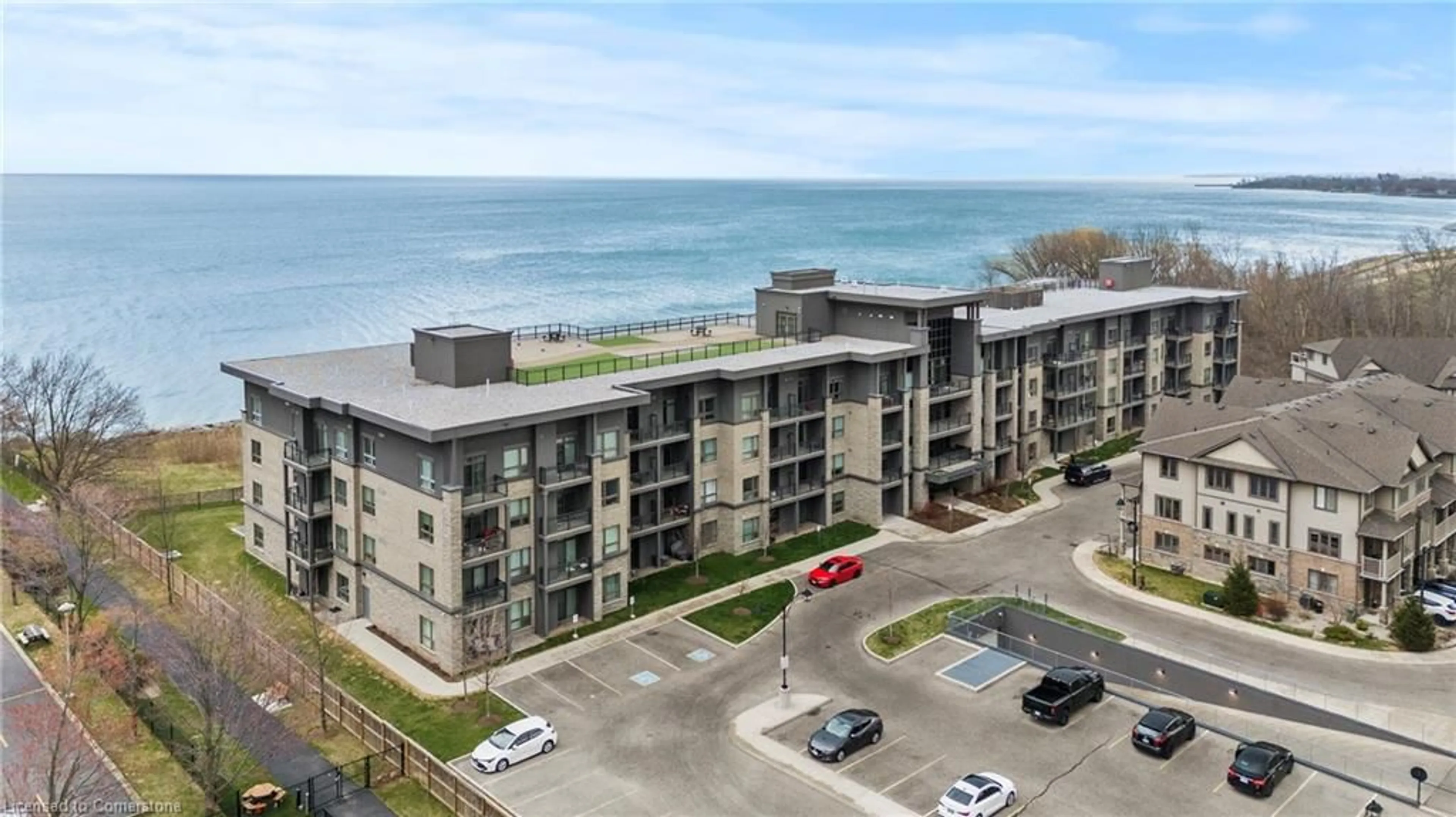 A pic from outside/outdoor area/front of a property/back of a property/a pic from drone, water/lake/river/ocean view for 35 Southshore Cres #230, Hamilton Ontario L8E 0J2