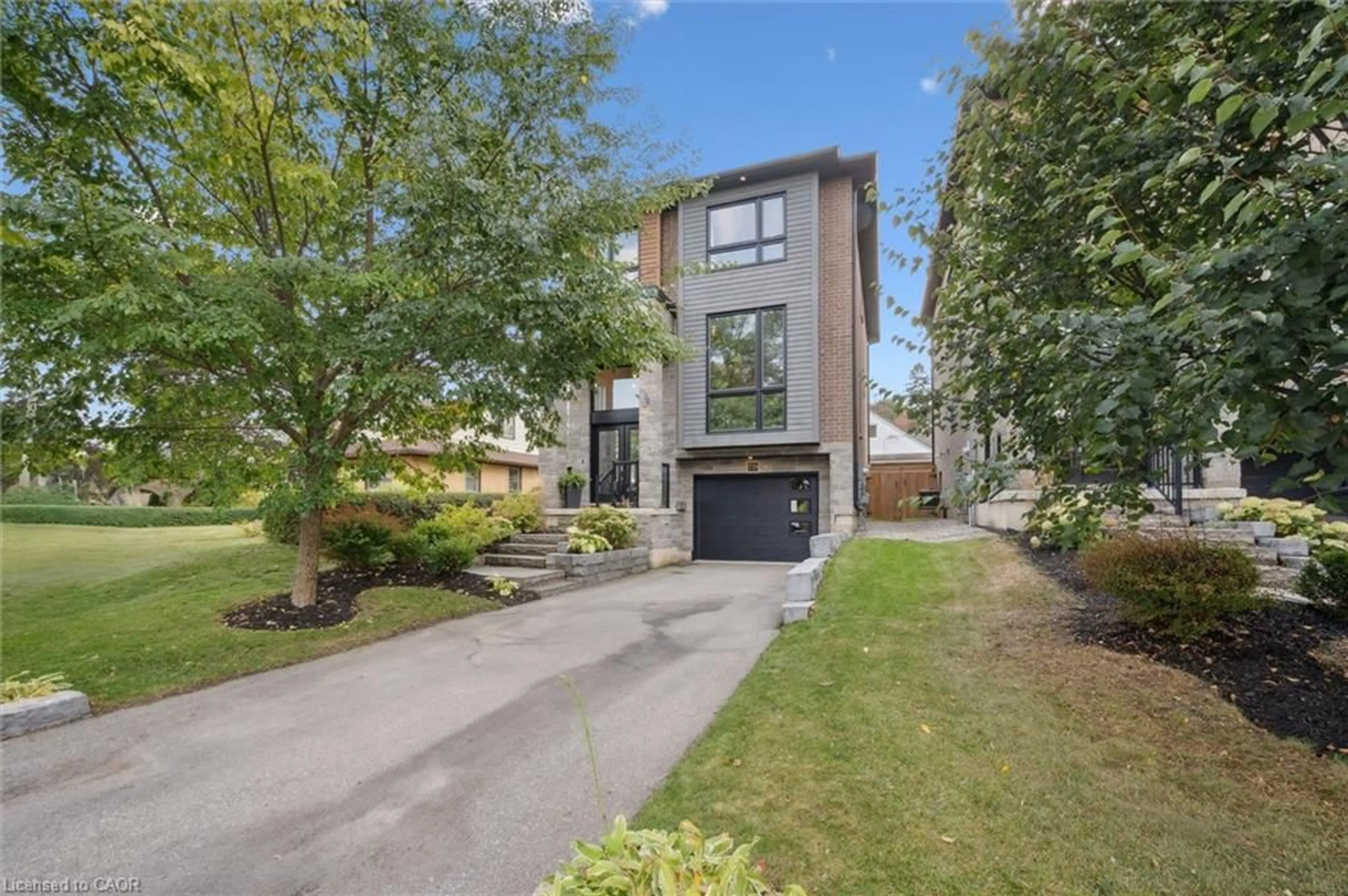 Home with brick exterior material, street for 739 Rockway Dr, Kitchener Ontario N2G 3B6