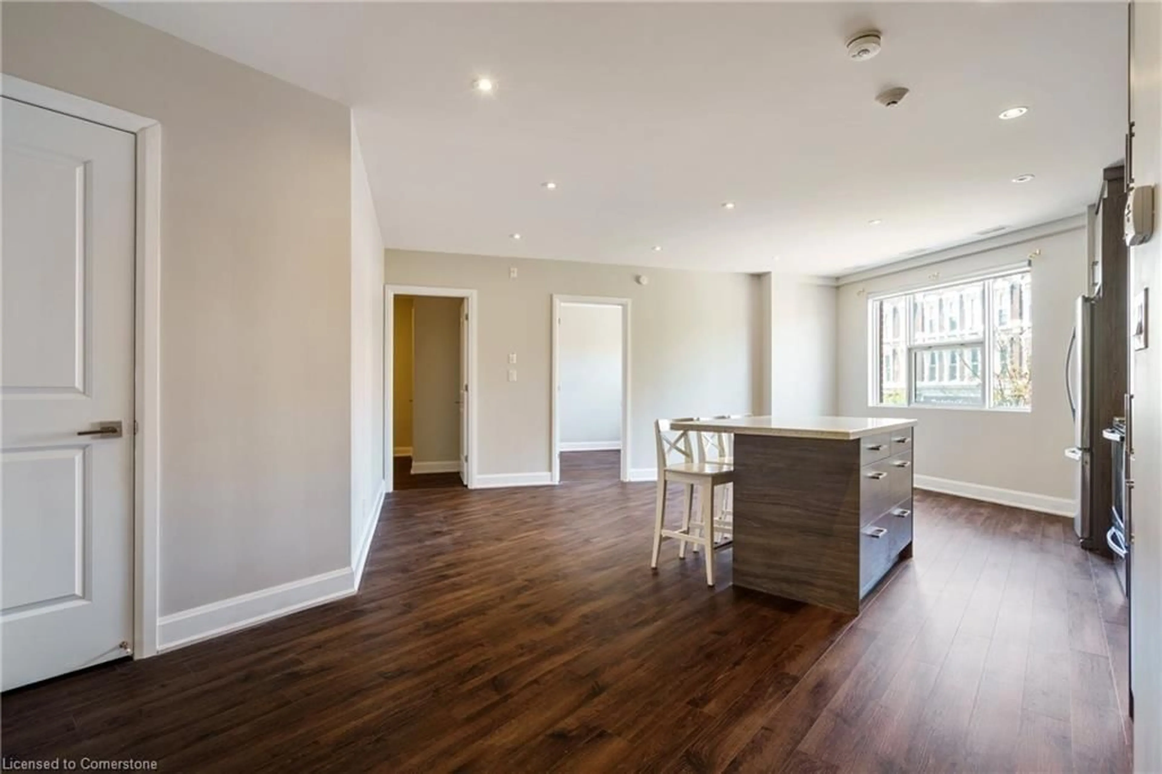 Open concept kitchen, wood/laminate floor for 2 King St #208, Dundas Ontario L9H 6Z1