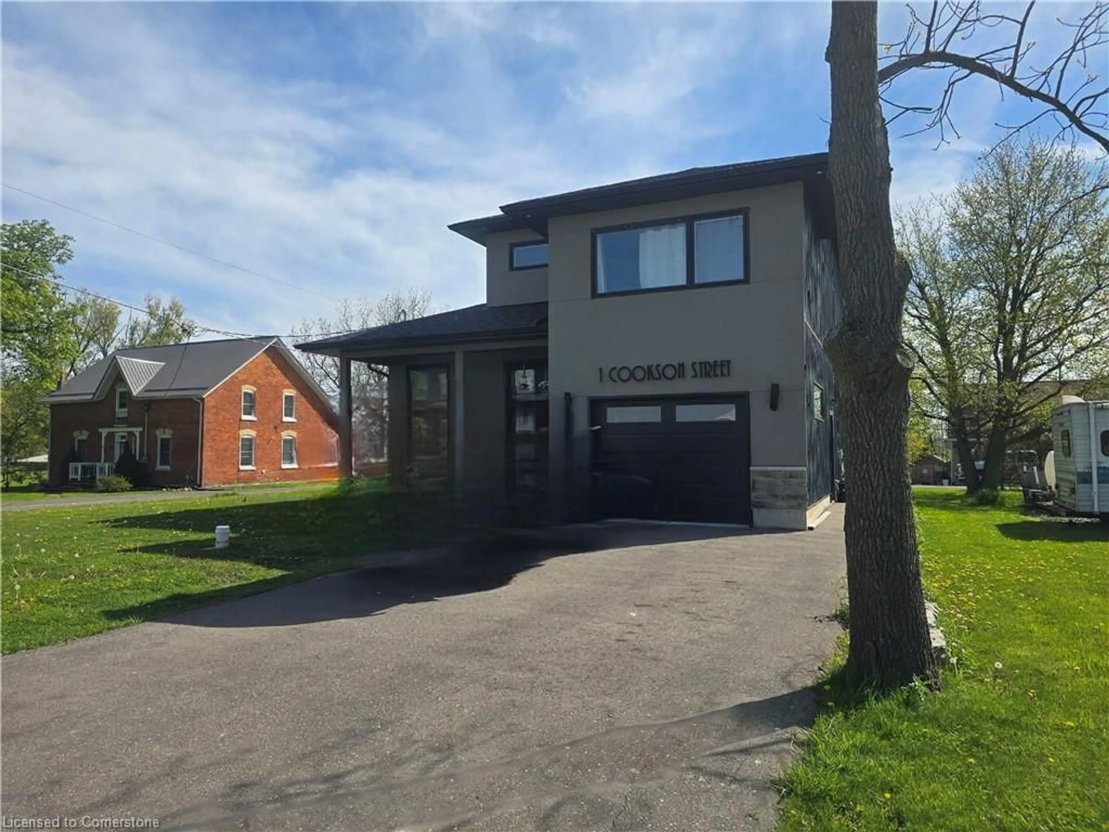Home with brick exterior material, building for 1 Cookson St, Port Ryerse Ontario N3Y 4K2