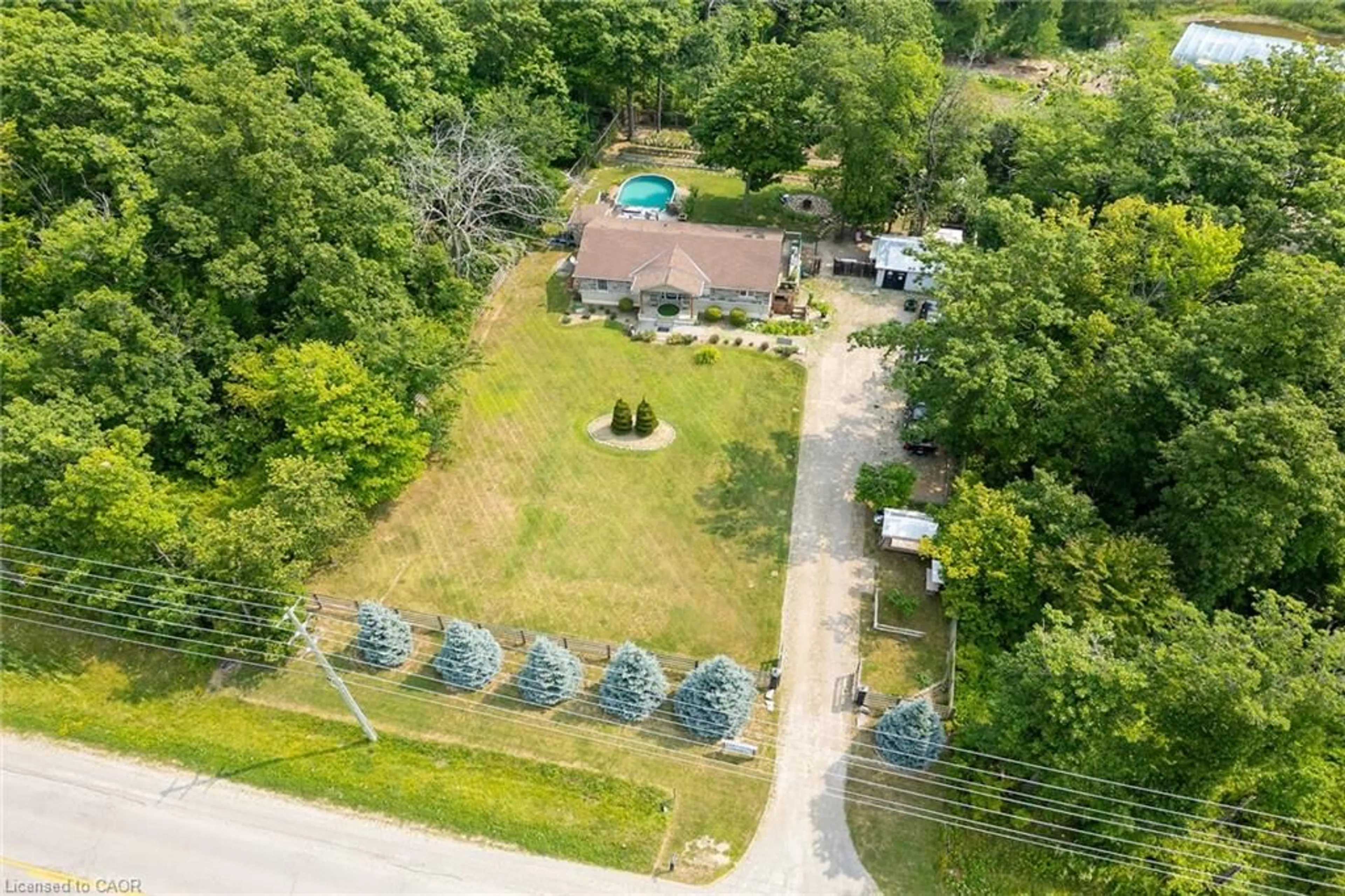 A pic from outside/outdoor area/front of a property/back of a property/a pic from drone, street for 920 Highway 56, York Ontario N0A 1R0