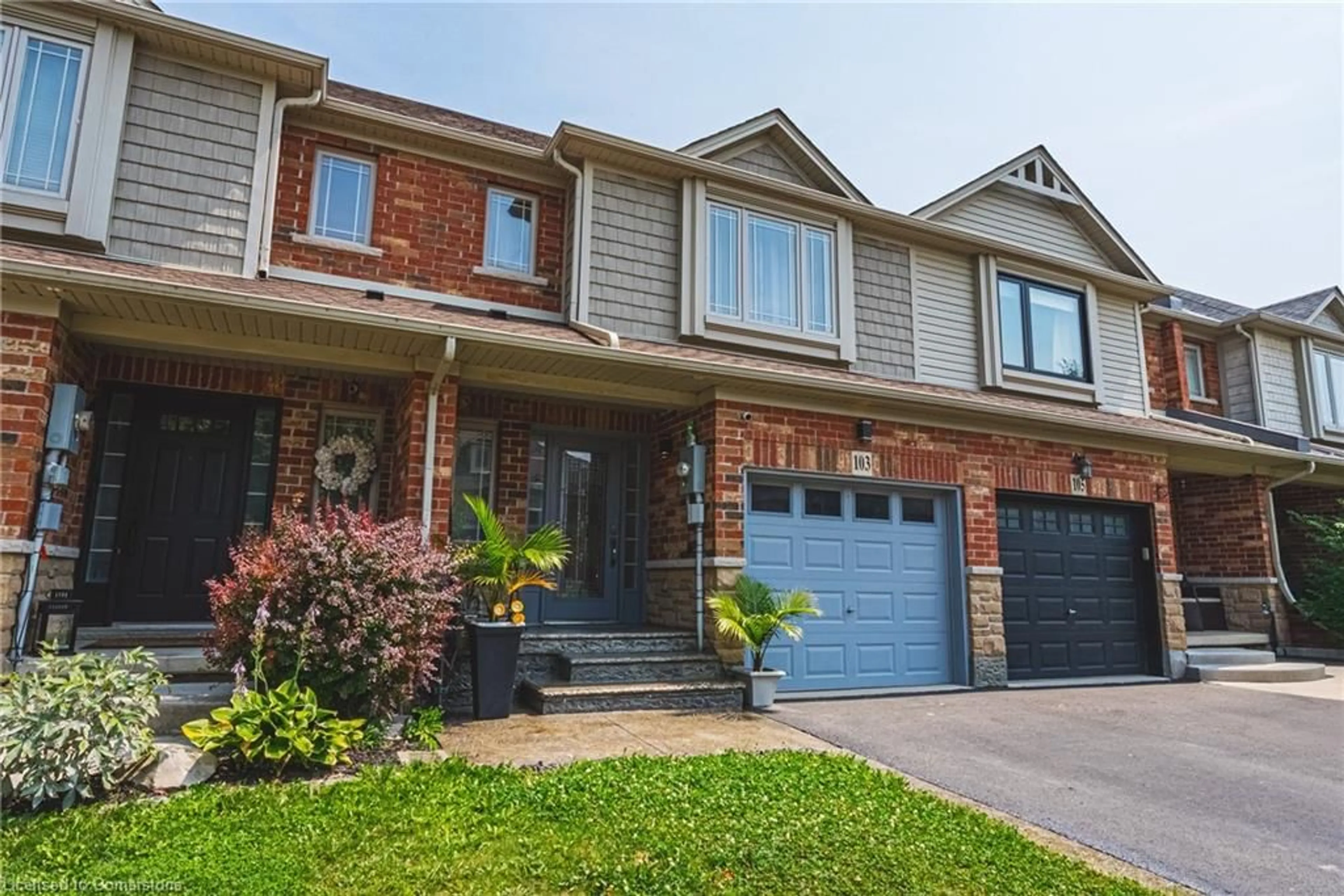 Home with brick exterior material, street for 103 Donald Bell Dr, Binbrook Ontario L0R 1C0