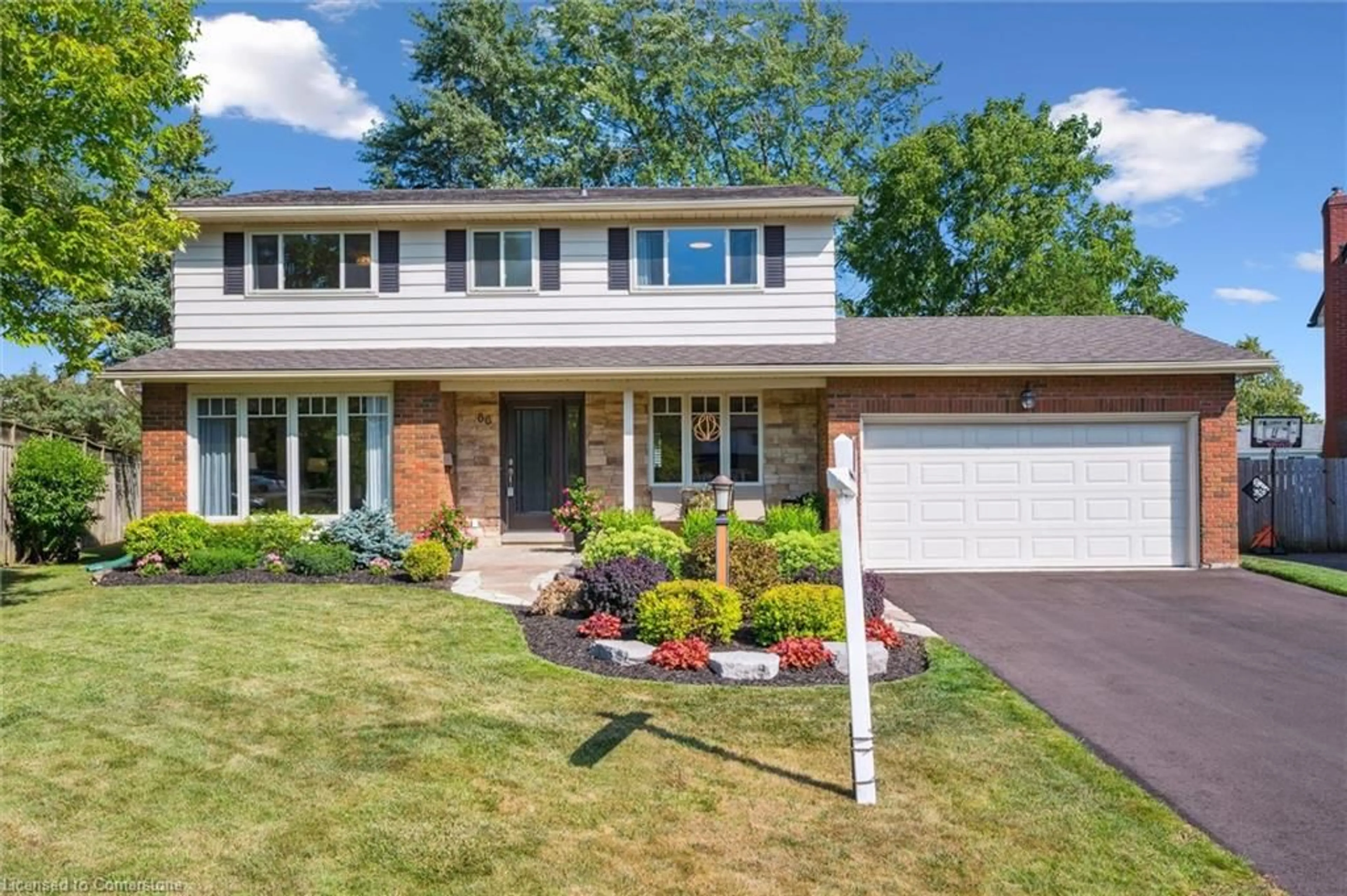 Home with brick exterior material, street for 66 Pinehurst Cres, Kitchener Ontario N2N 1E4