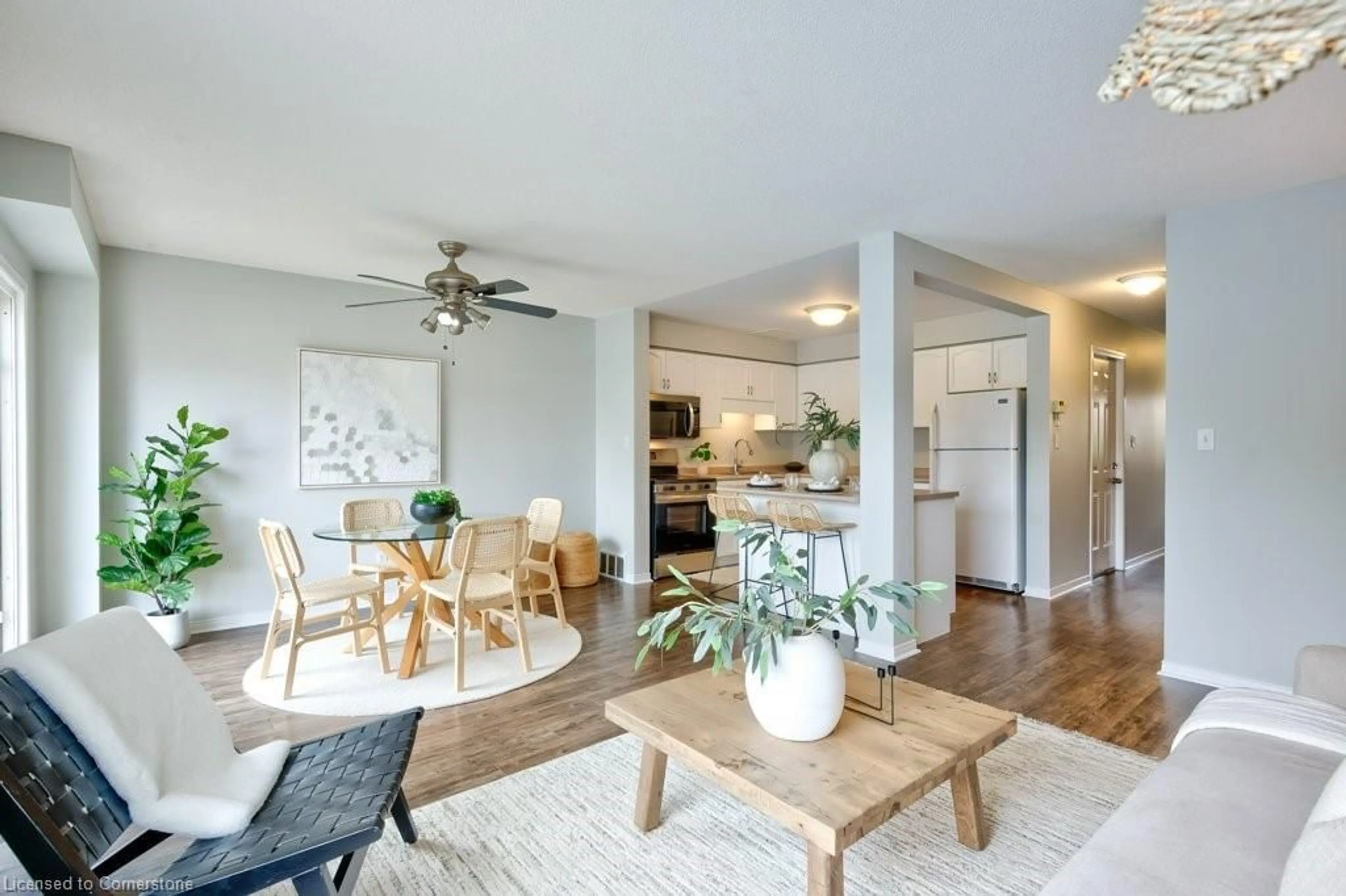 Living room with furniture, wood/laminate floor for 84 Westmeadow Dr #2, Kitchener Ontario N2N 3P1
