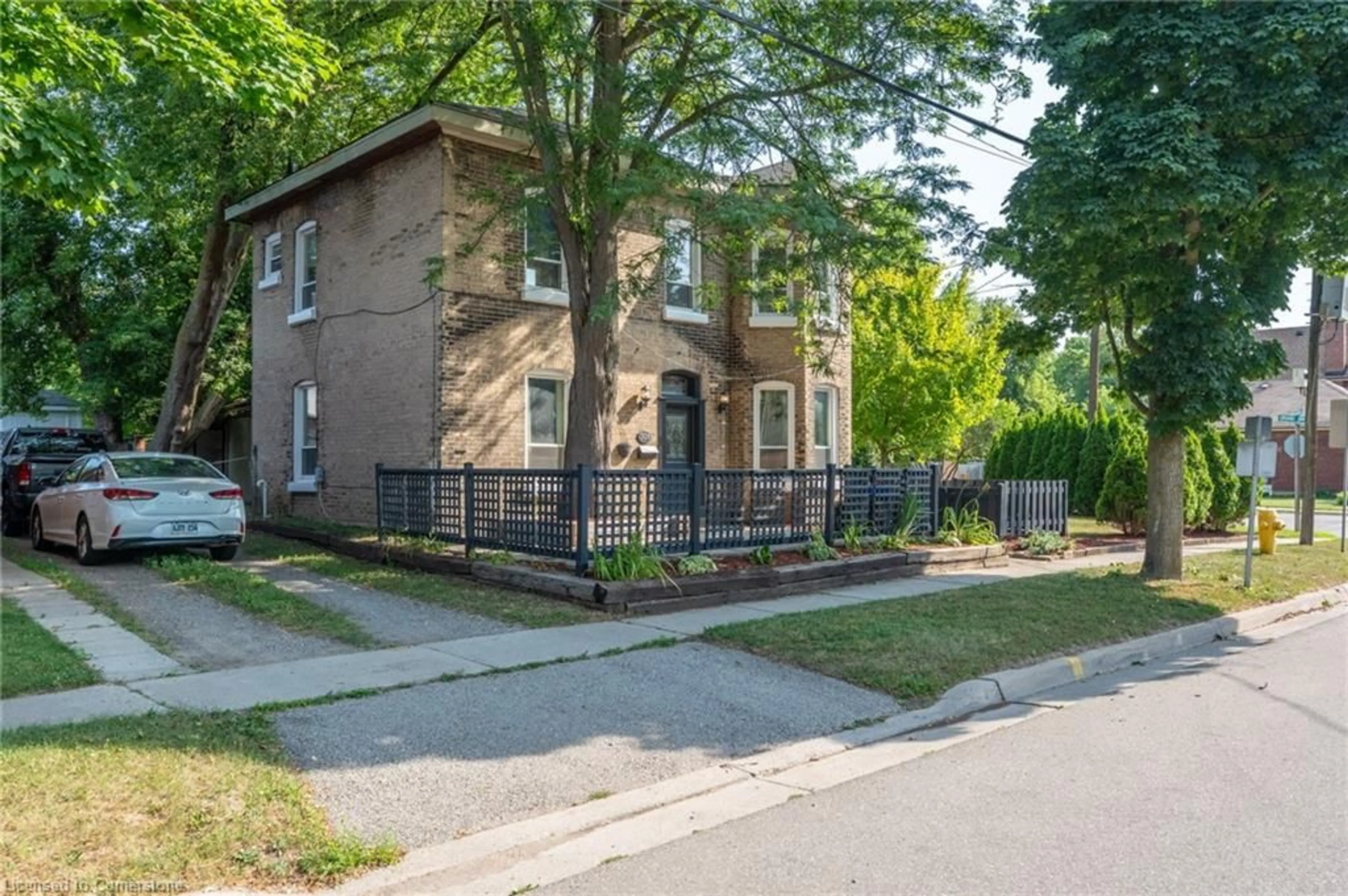 Home with brick exterior material, street for 301 Grand River Ave, Brantford Ontario N3T 4Y6