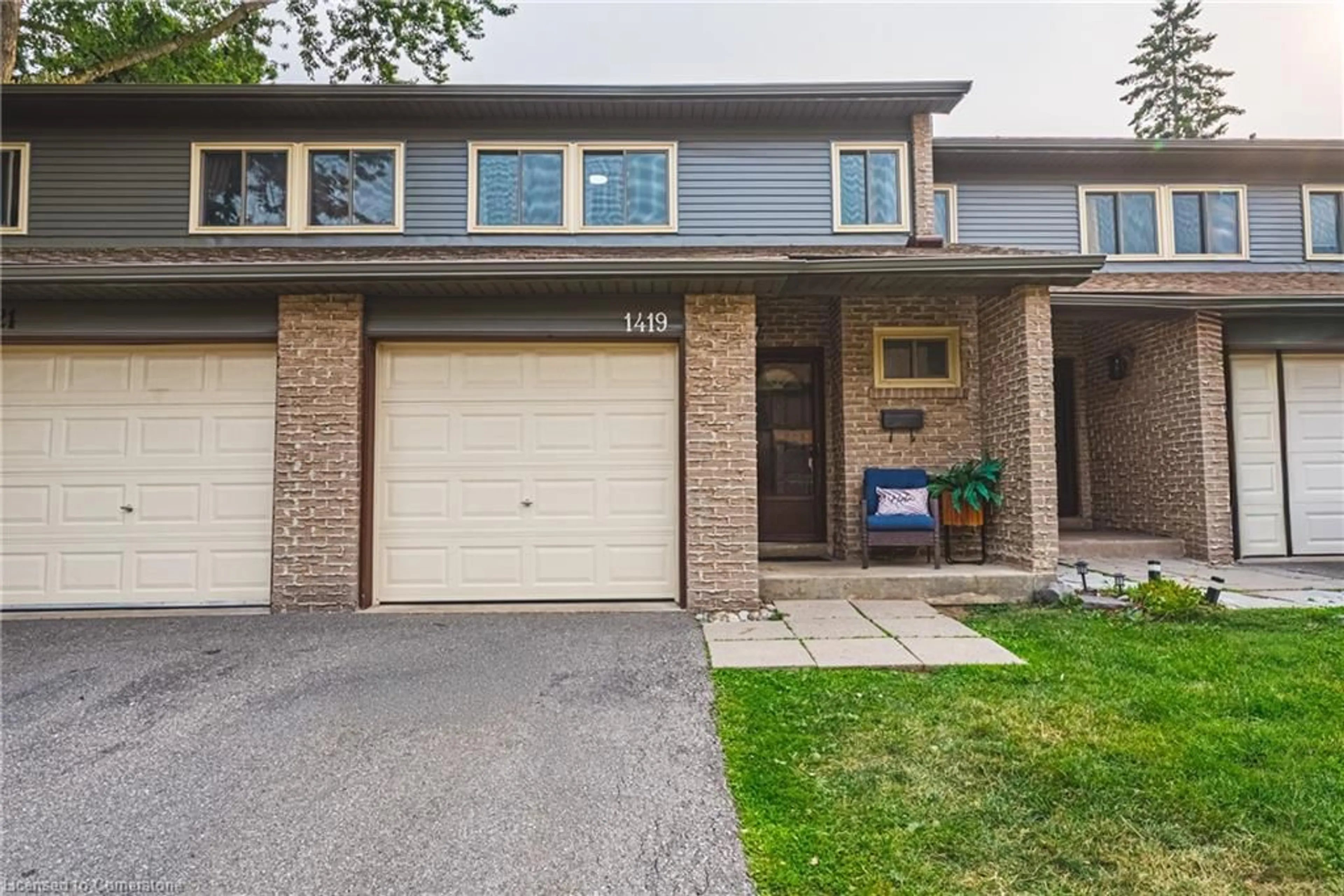 Home with brick exterior material, street for 1419 Ester Dr, Burlington Ontario L7P 1L5