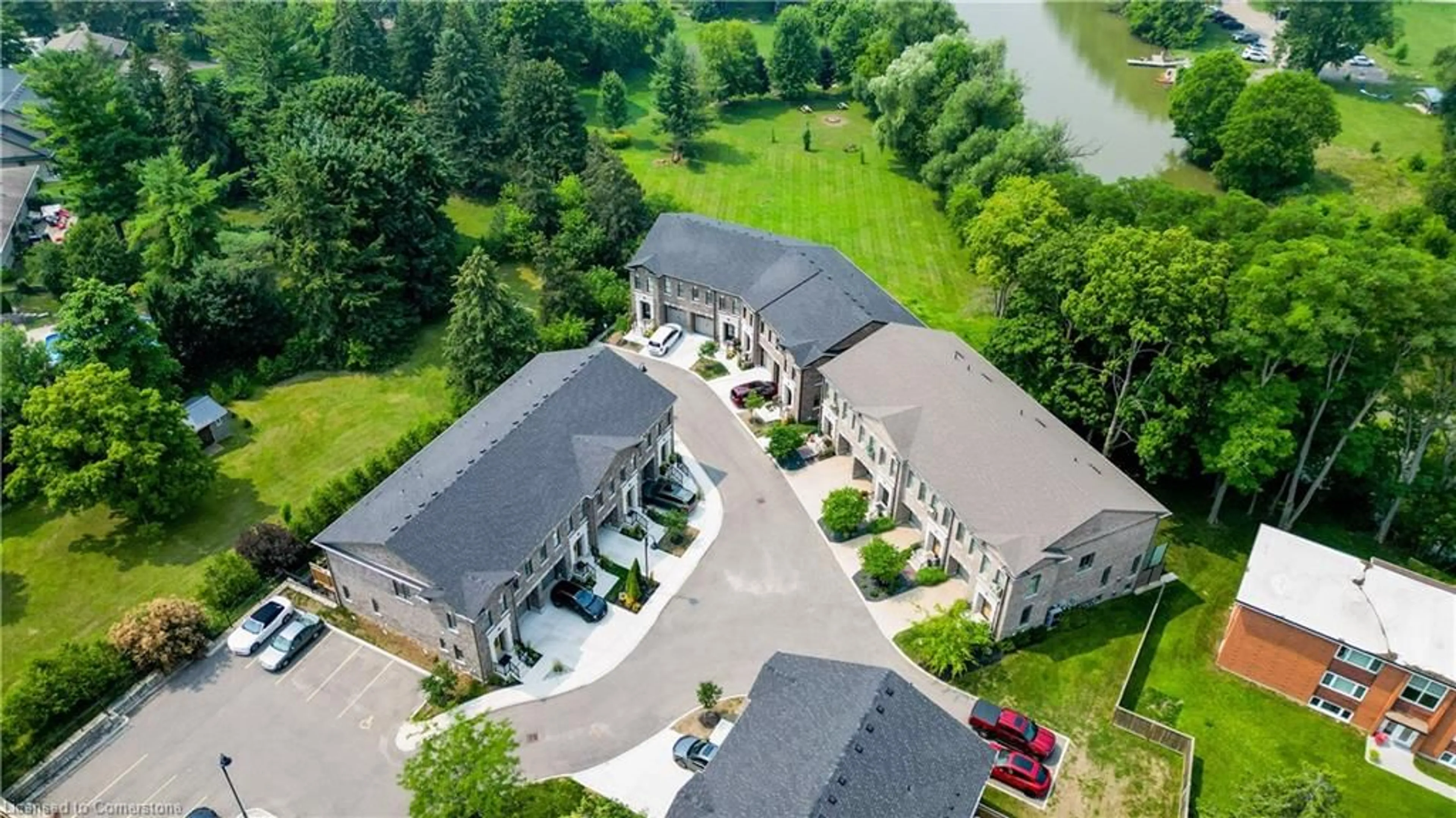 A pic from outside/outdoor area/front of a property/back of a property/a pic from drone, water/lake/river/ocean view for 362 Fairview St #3, New Hamburg Ontario N3A 1M2