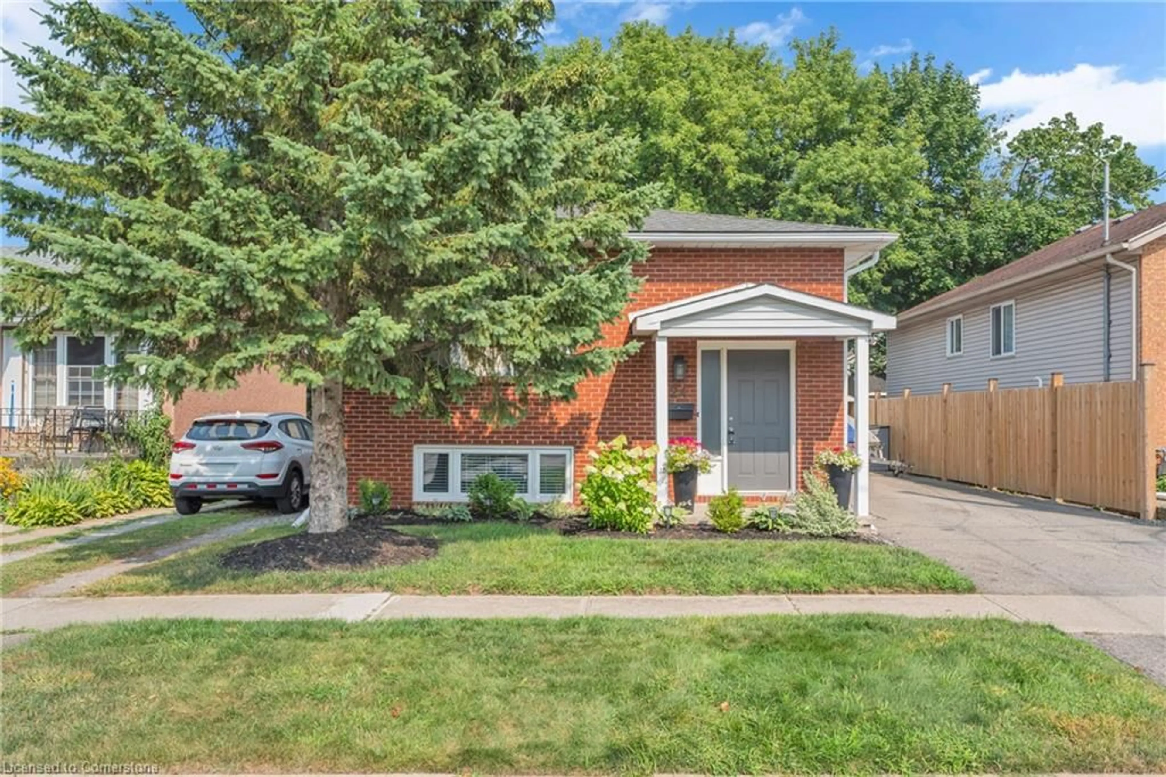Home with brick exterior material, street for 24 Augusta Ave, St. Catharines Ontario L2M 5R2