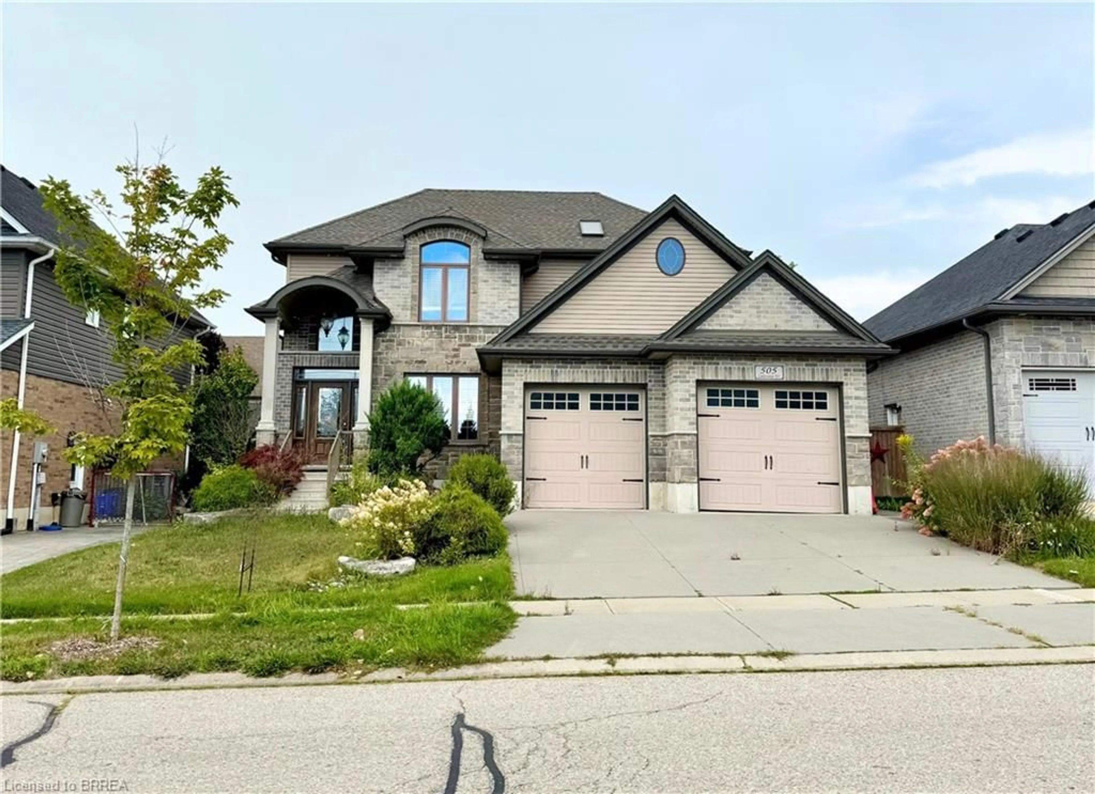 Home with brick exterior material, street for 505 Lakeview Dr, Woodstock Ontario N4T 0C7