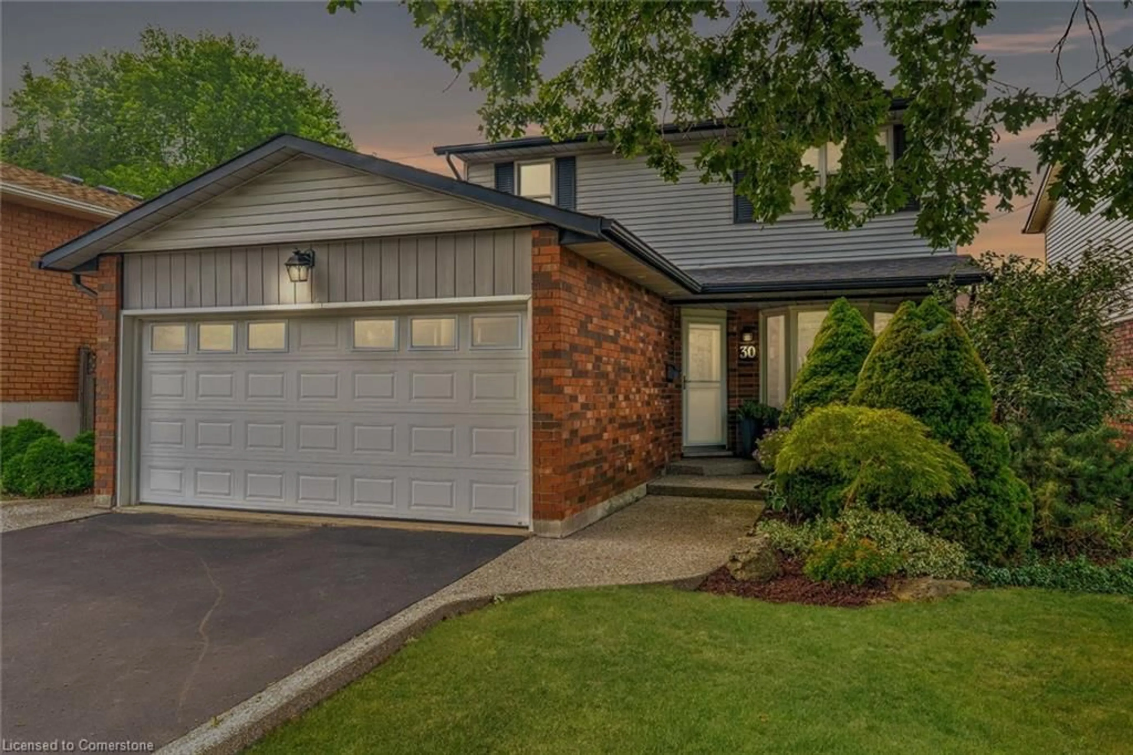 Home with brick exterior material, street for 30 Rosewell St, Hamilton Ontario L8W 2L1