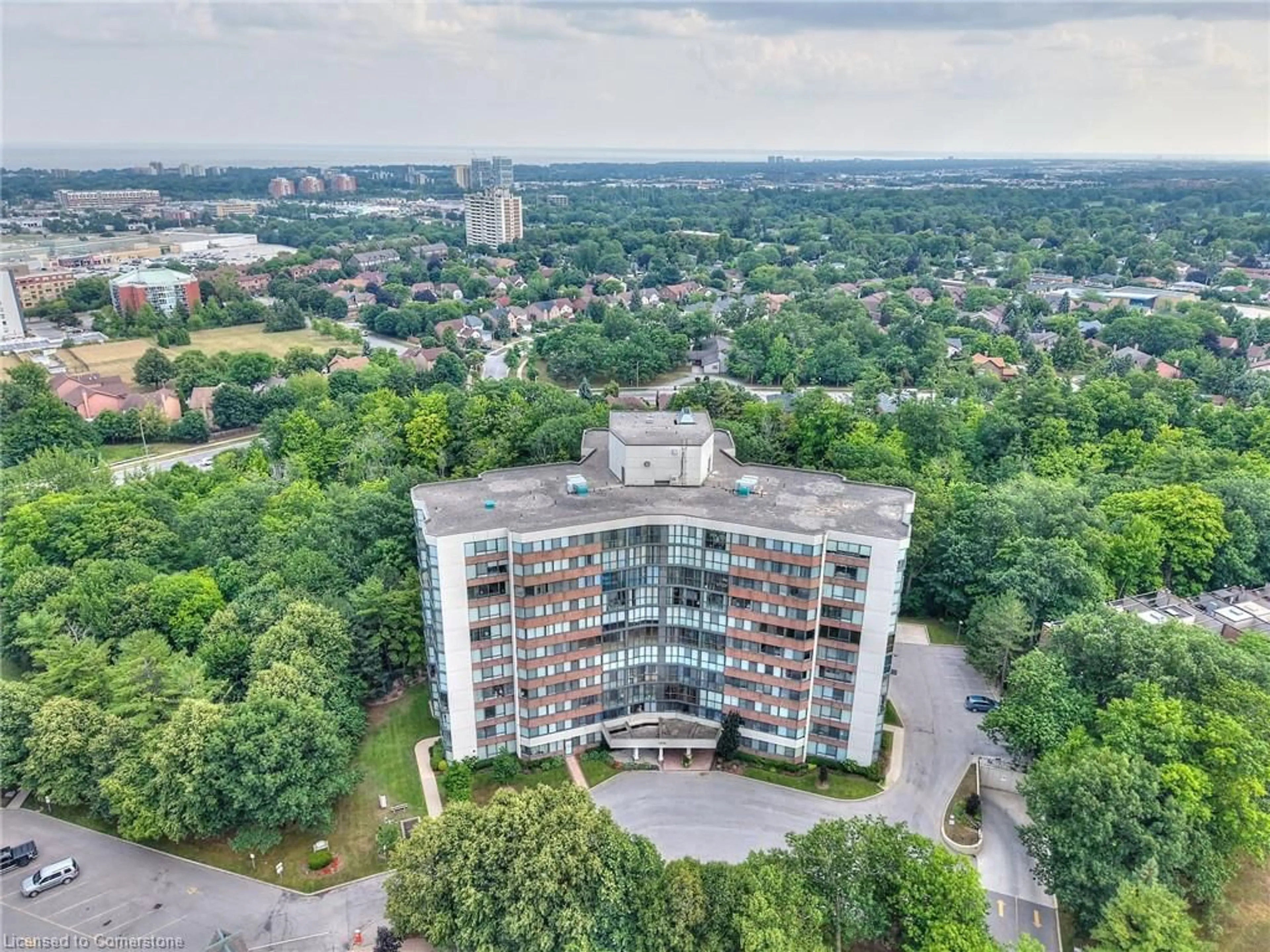 A pic from outside/outdoor area/front of a property/back of a property/a pic from drone, city buildings view from balcony for 1240 Marlborough Crt #504, Oakville Ontario L6H 3K7