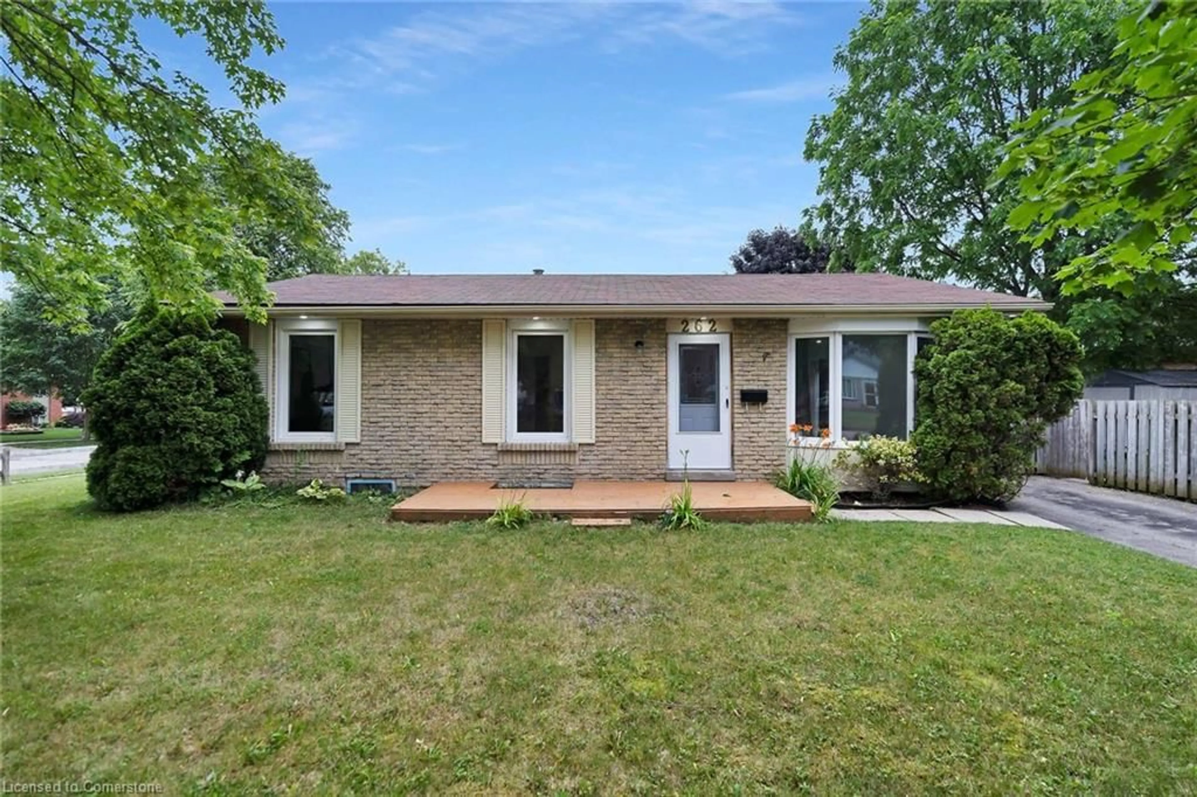 Home with brick exterior material, street for 262 Heritage Dr, Kitchener Ontario N2B 3K8