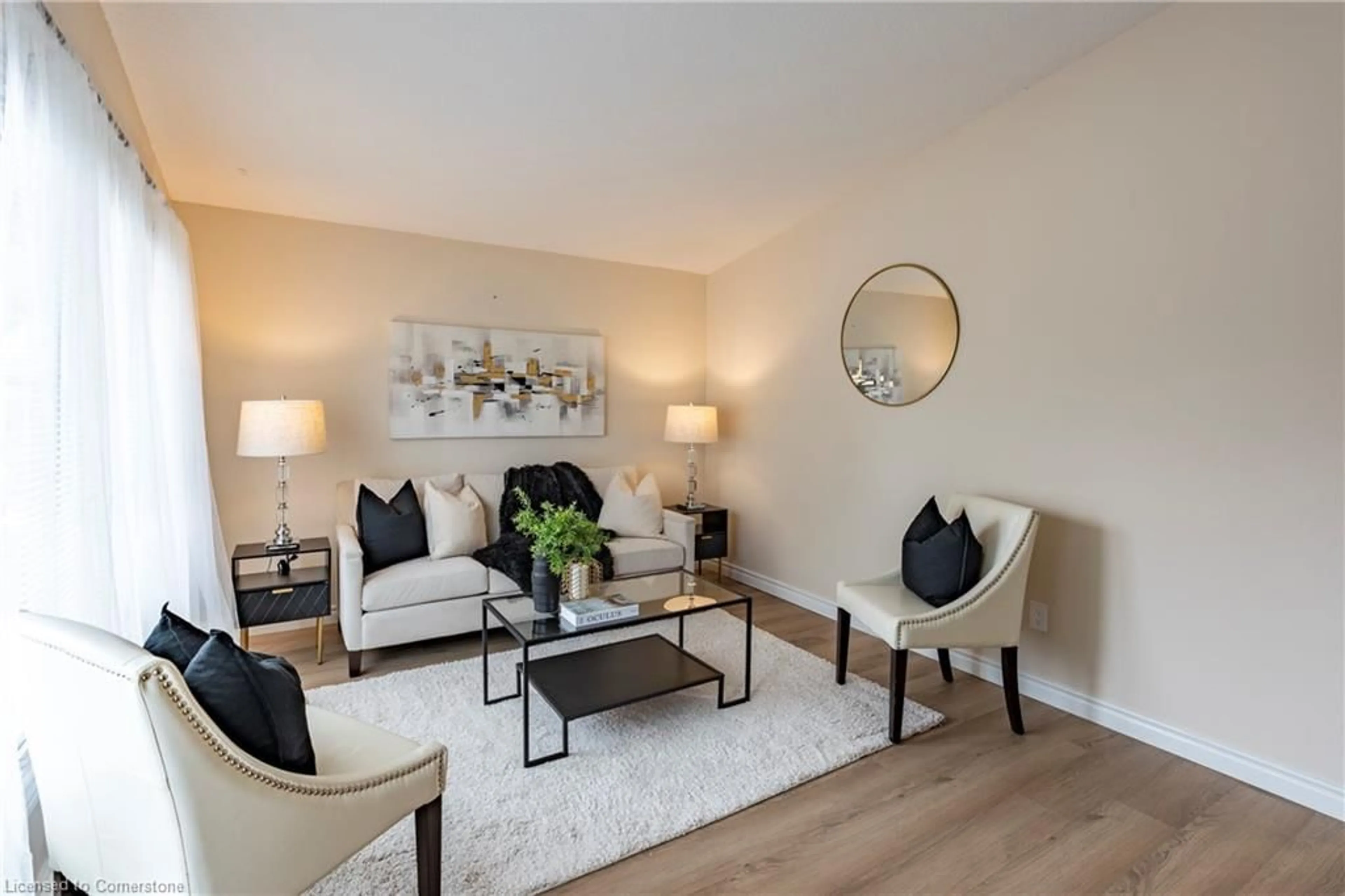 Living room with furniture, wood/laminate floor for 151 Greendale Cres, Kitchener Ontario N2A 2R5