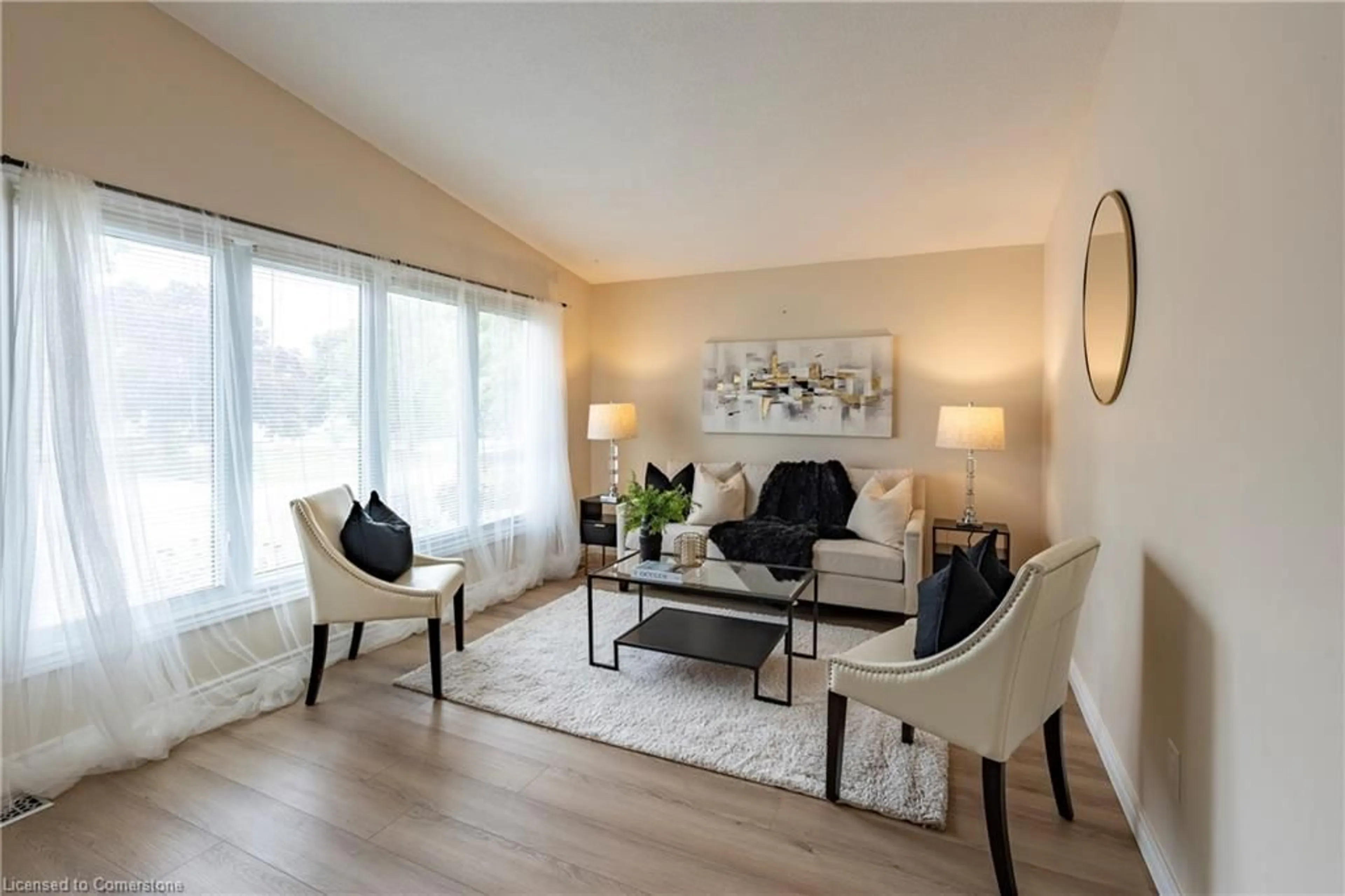 Living room with furniture, wood/laminate floor for 151 Greendale Cres, Kitchener Ontario N2A 2R5